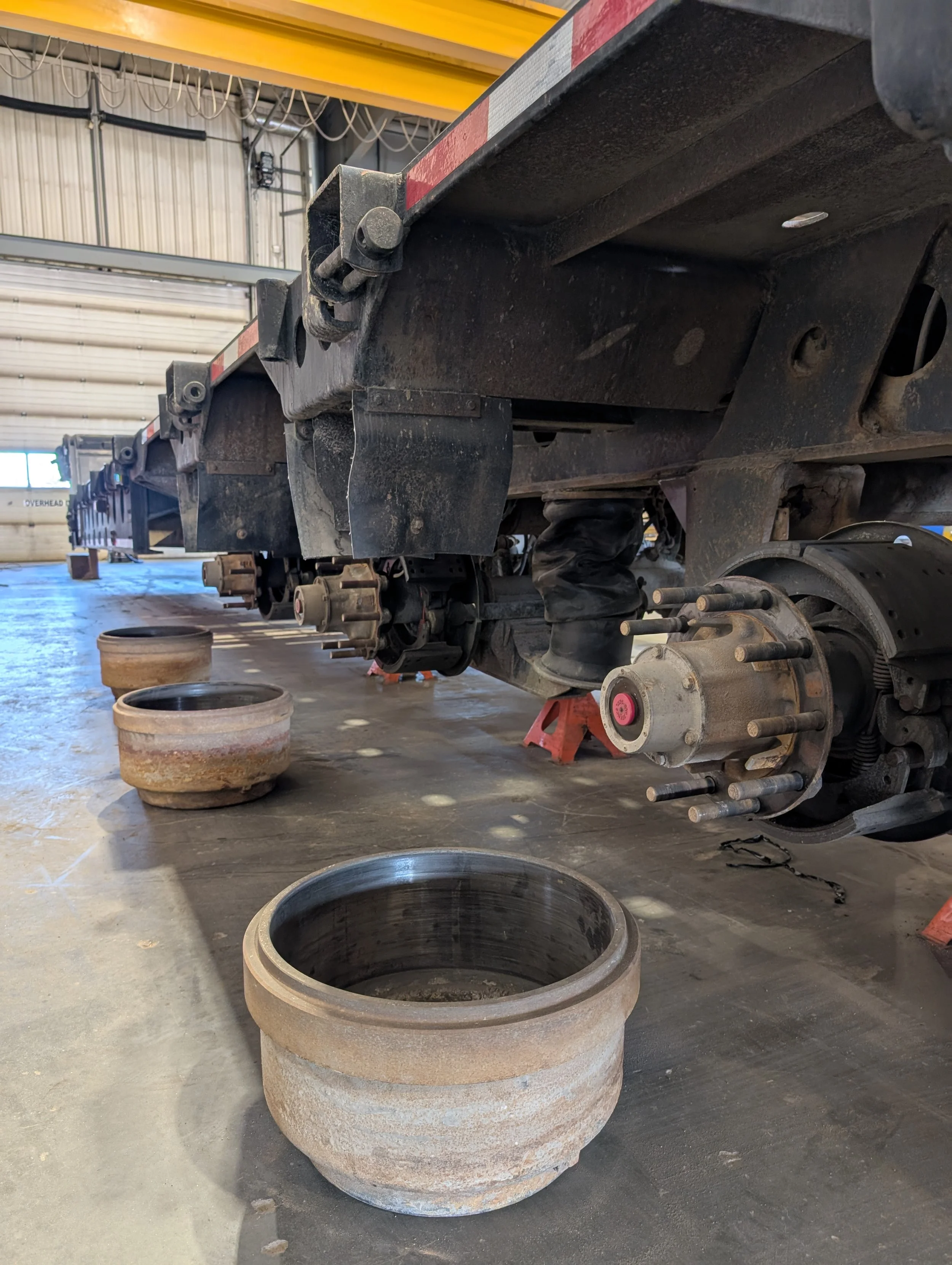 commercial trailer brake system disassembled during trailer repair service