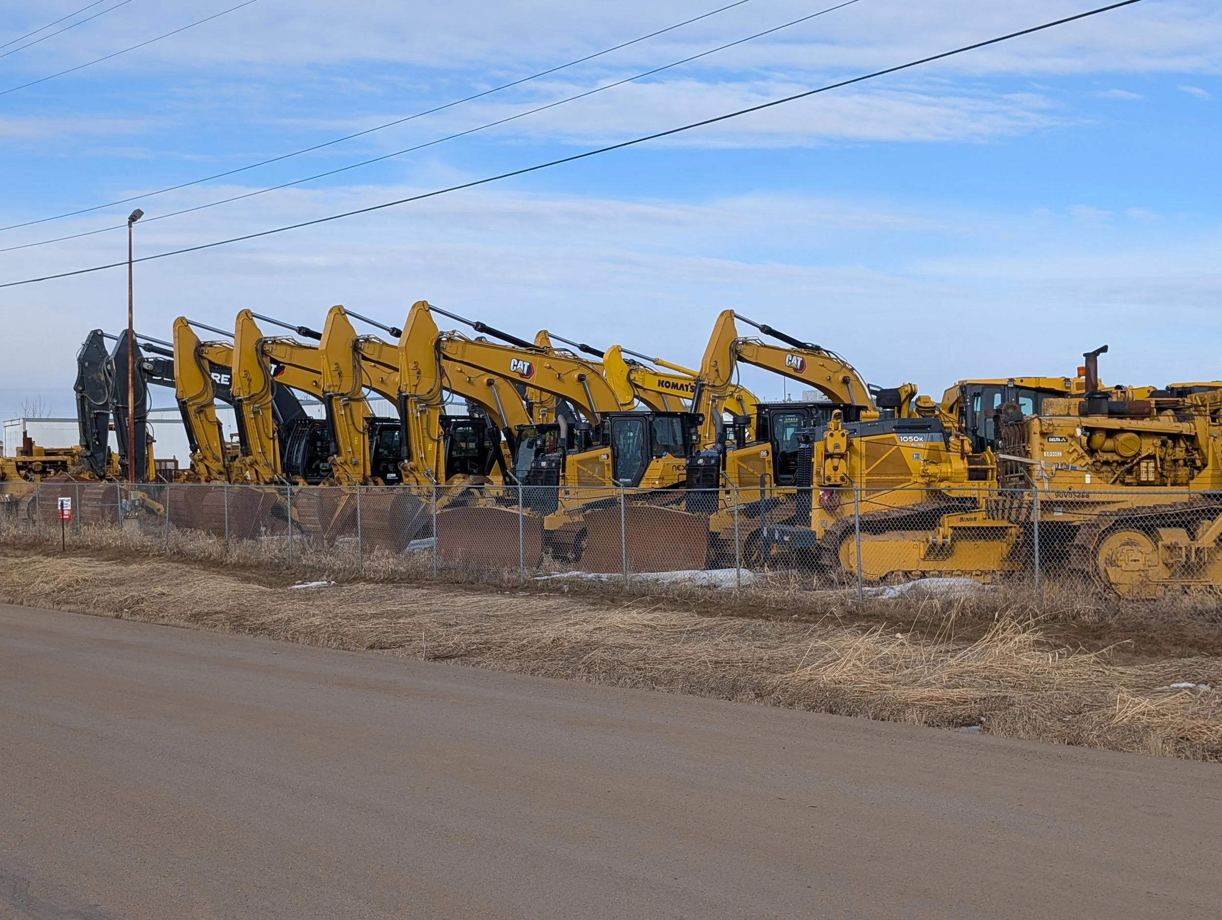 fleet of heavy equipment supported through scheduled fleet service and maintenance