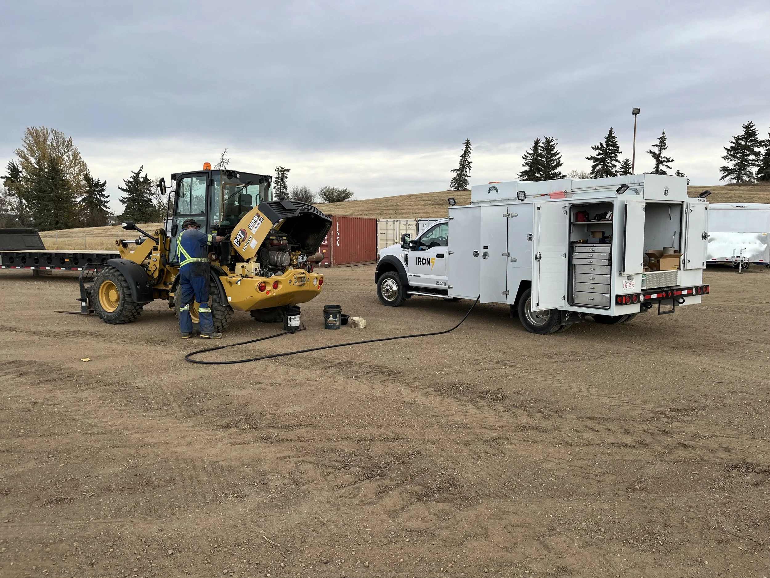 mobile heavy equipment repair performed on site by IRON 5 service truck