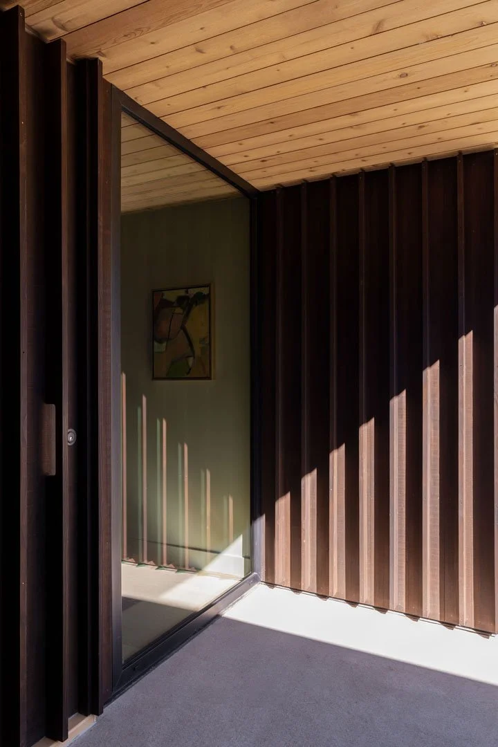 Wood-clad entry breezeway opening into the home, Toll Canyon, Park City, Utah.