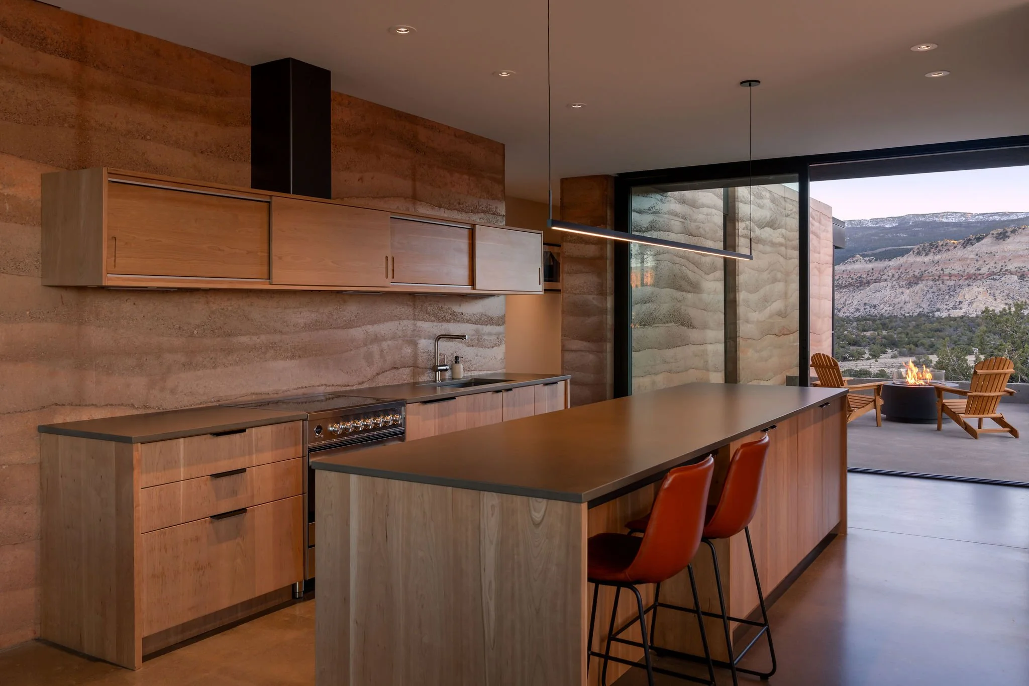 modern kitchen opening to a patio