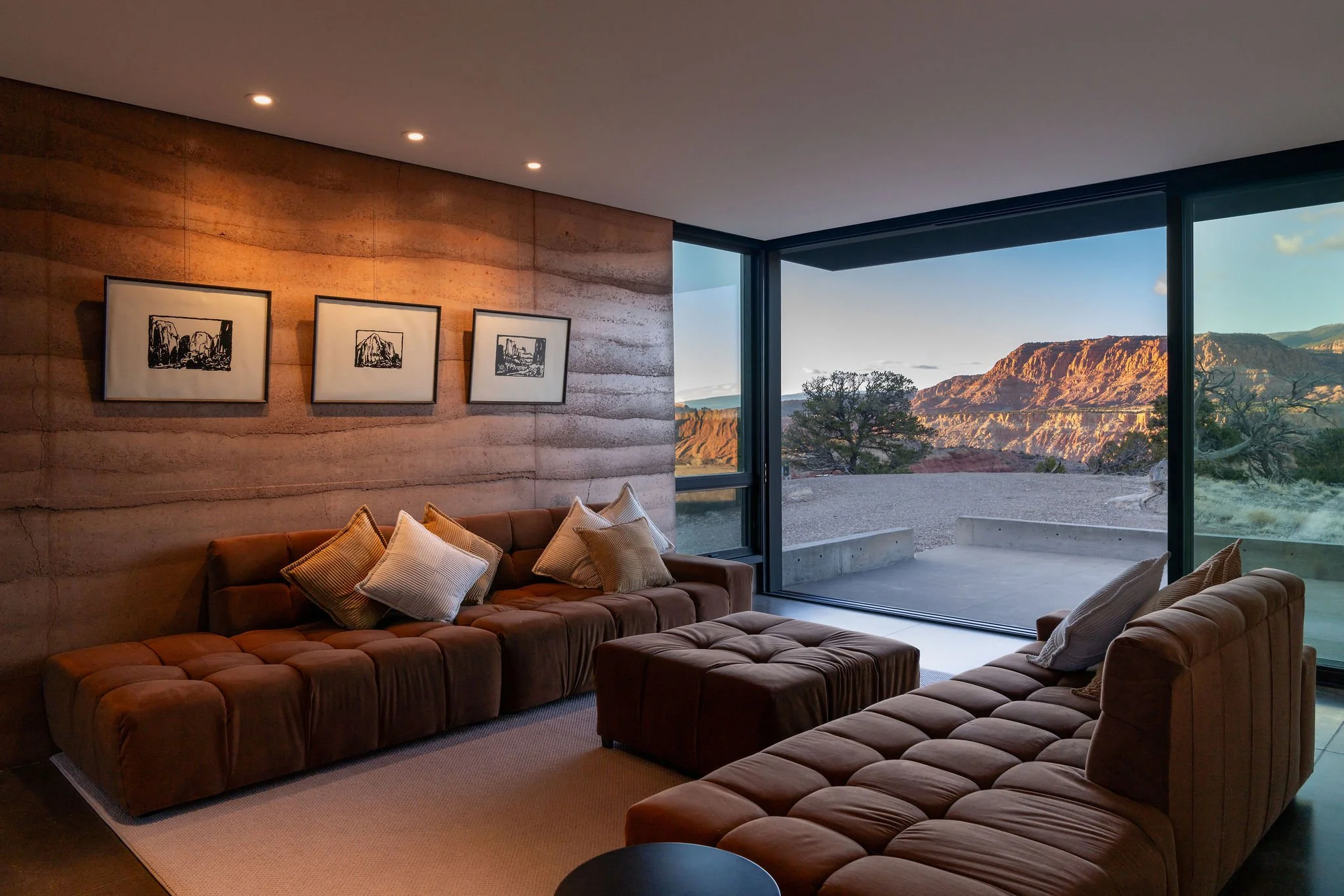 simple living room opening to the desert environment