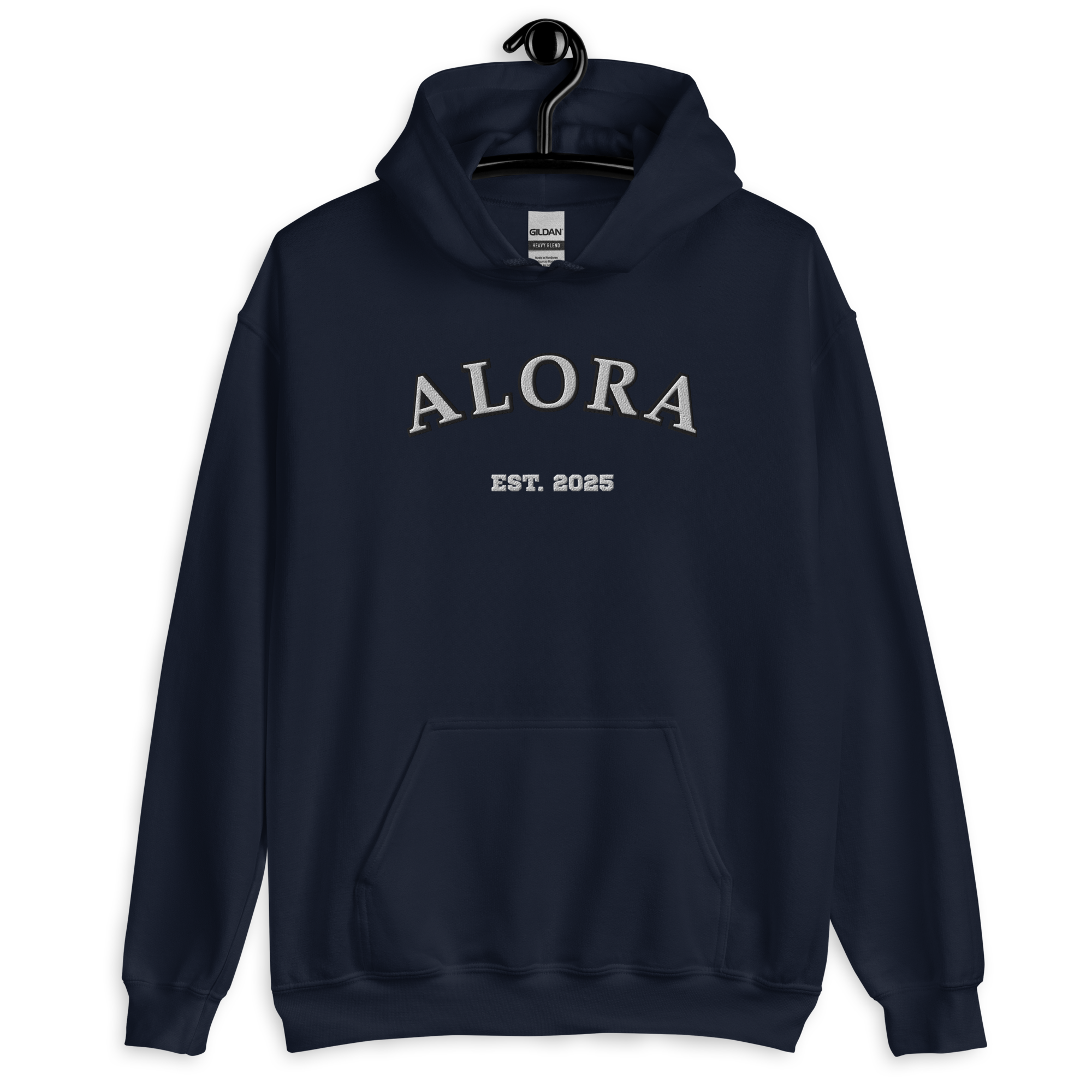 Navy blue hoodie with white embroidered text 'ALORA' and 'EST. 2025' on the front, hanging on a black hanger against a black background.