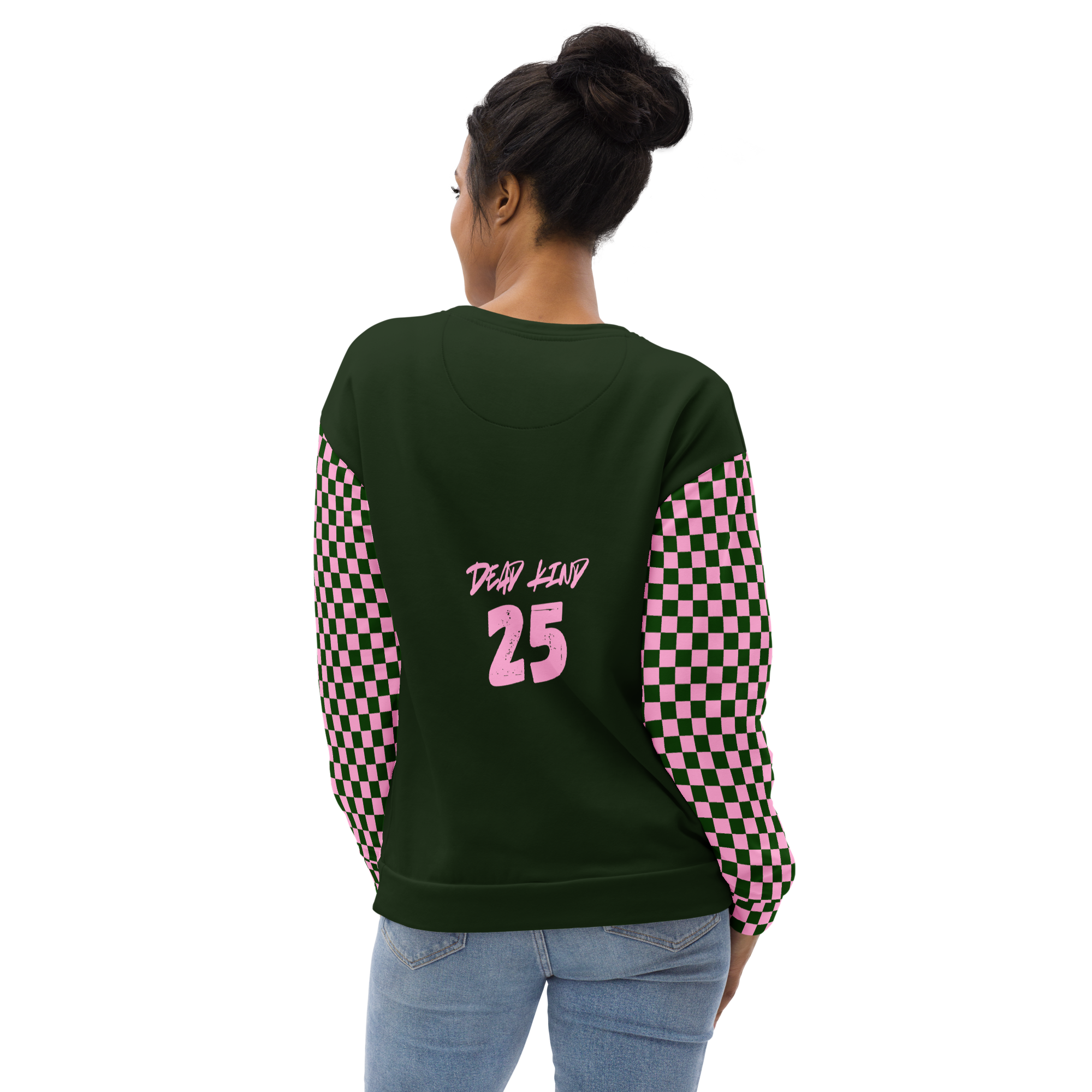 Back view of a woman wearing a black sweatshirt with pink checkered sleeves and the words "DEAD LAND" and the number "25" on the back, paired with light blue jeans.