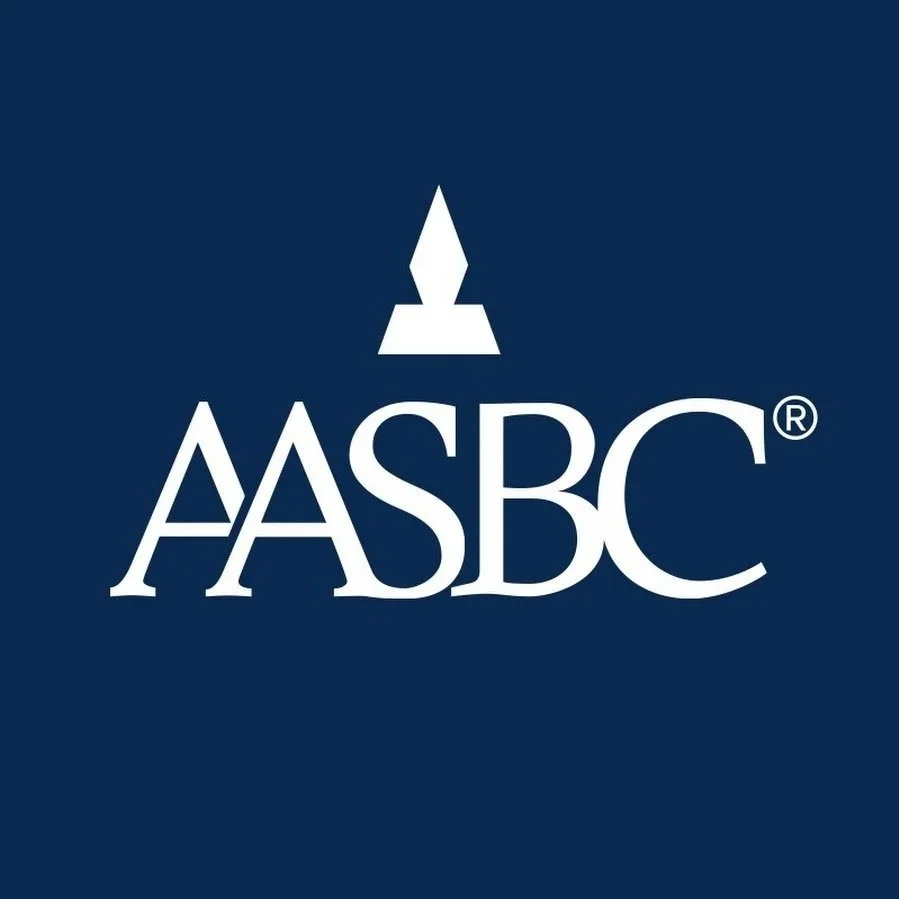 ASBC logo with a stylized fountain pen nib above the letters 'ASBC' on a dark blue background.