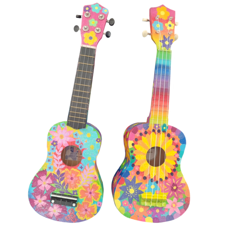 Two Colourful ukuleles, decorated with bright floral patterns and rainbow colors.