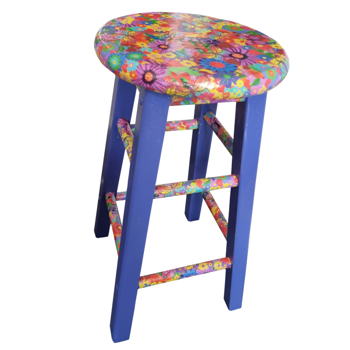 Colourful wooden stool with a floral pattern on the seat and legs, and bright blue legs.