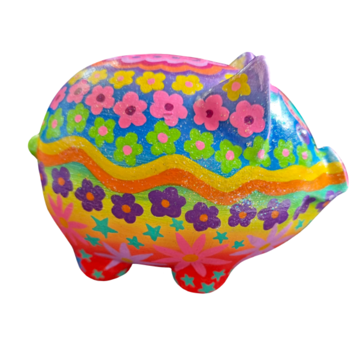 Colorful foam seashell decorated with bright flowers and rainbow patterns