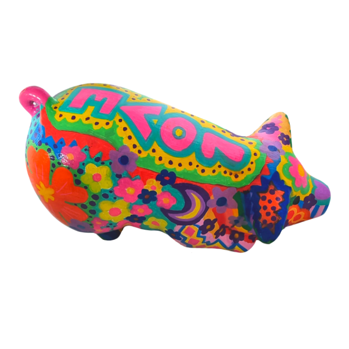 Colourful painted pig figurine with vibrant floral and abstract designs, featuring the word 'LOVE' written on its back.
