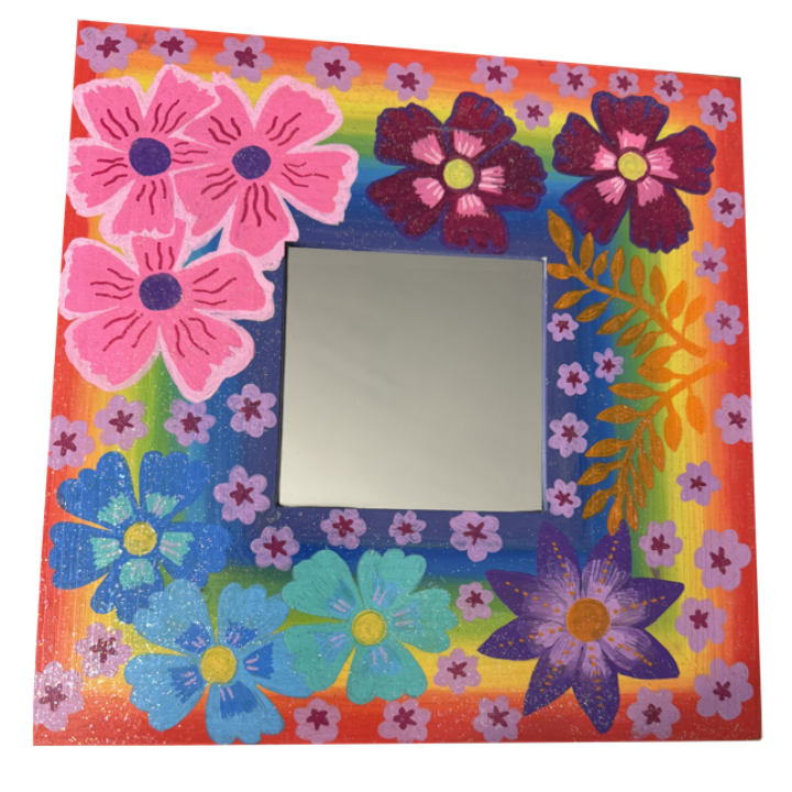Colourful, floral decorated picture frame with pink, purple, blue, and green flowers surrounding a blank square in the center.