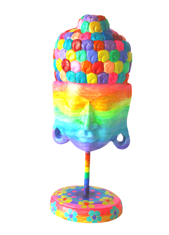 Colourful buddha head wood sculpture with rainbow colors and flower decorations on the base.
