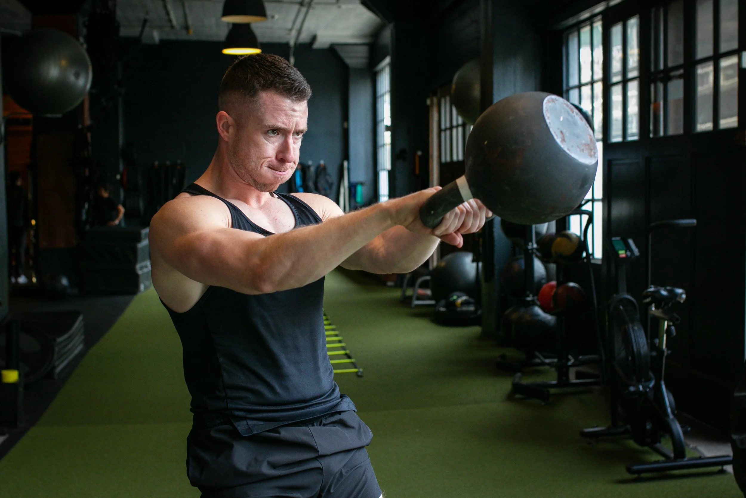 Training with a kettlebell requires proper breathing techniques.