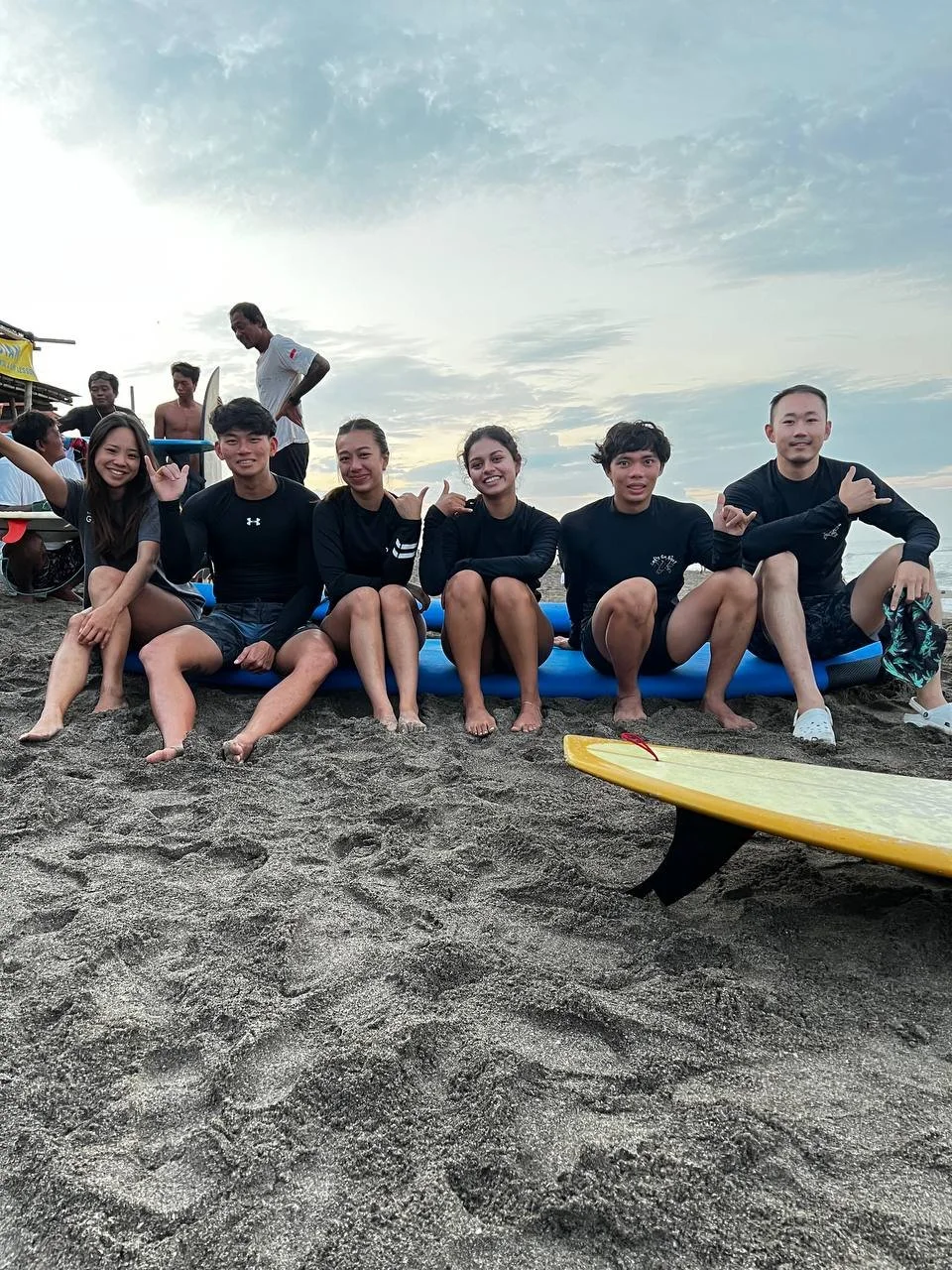 9-12 May 2025 surf - 5 sit on surfboard.JPG