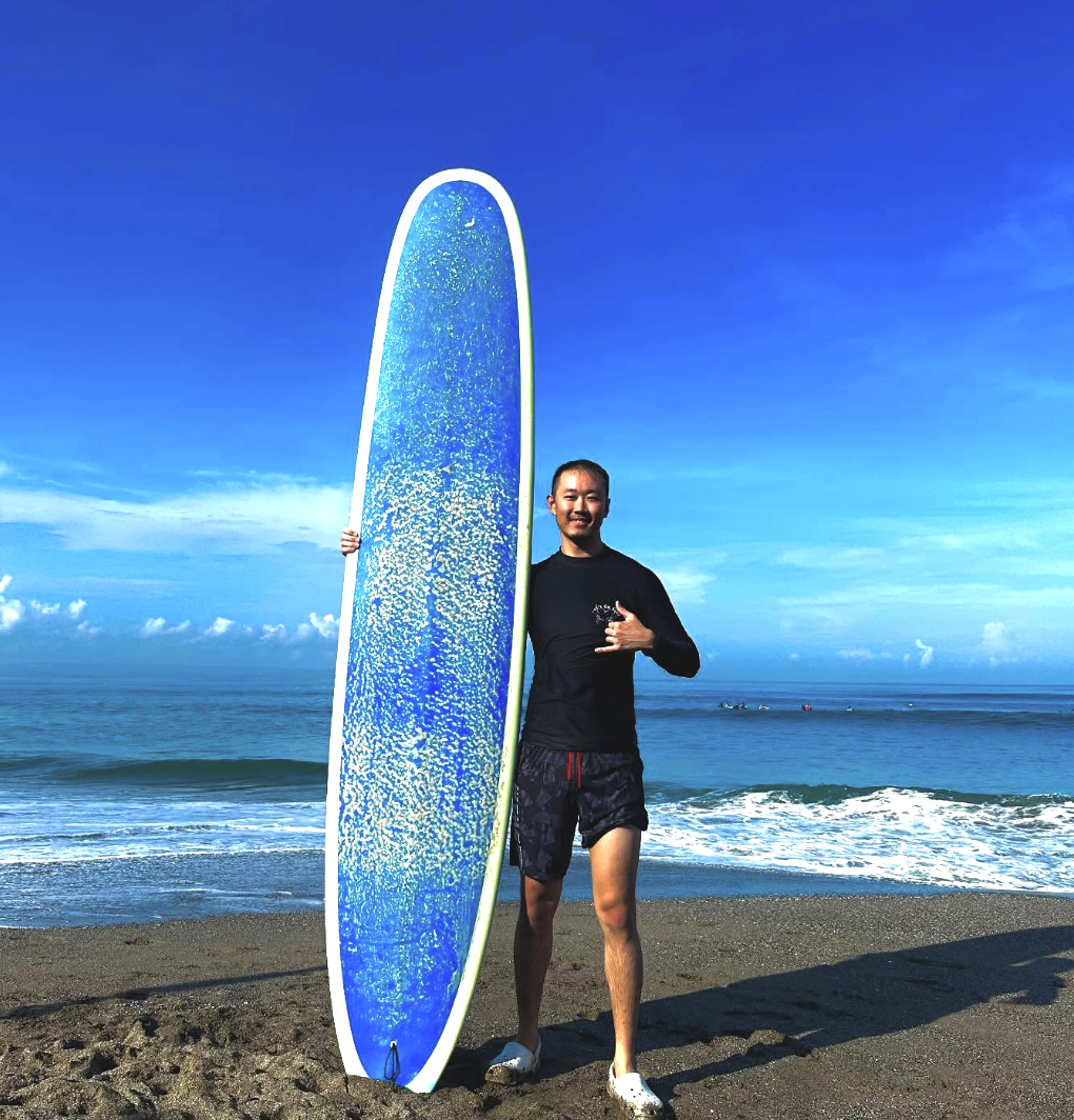 9-12 May 2025 surf - ethan posing with board.png