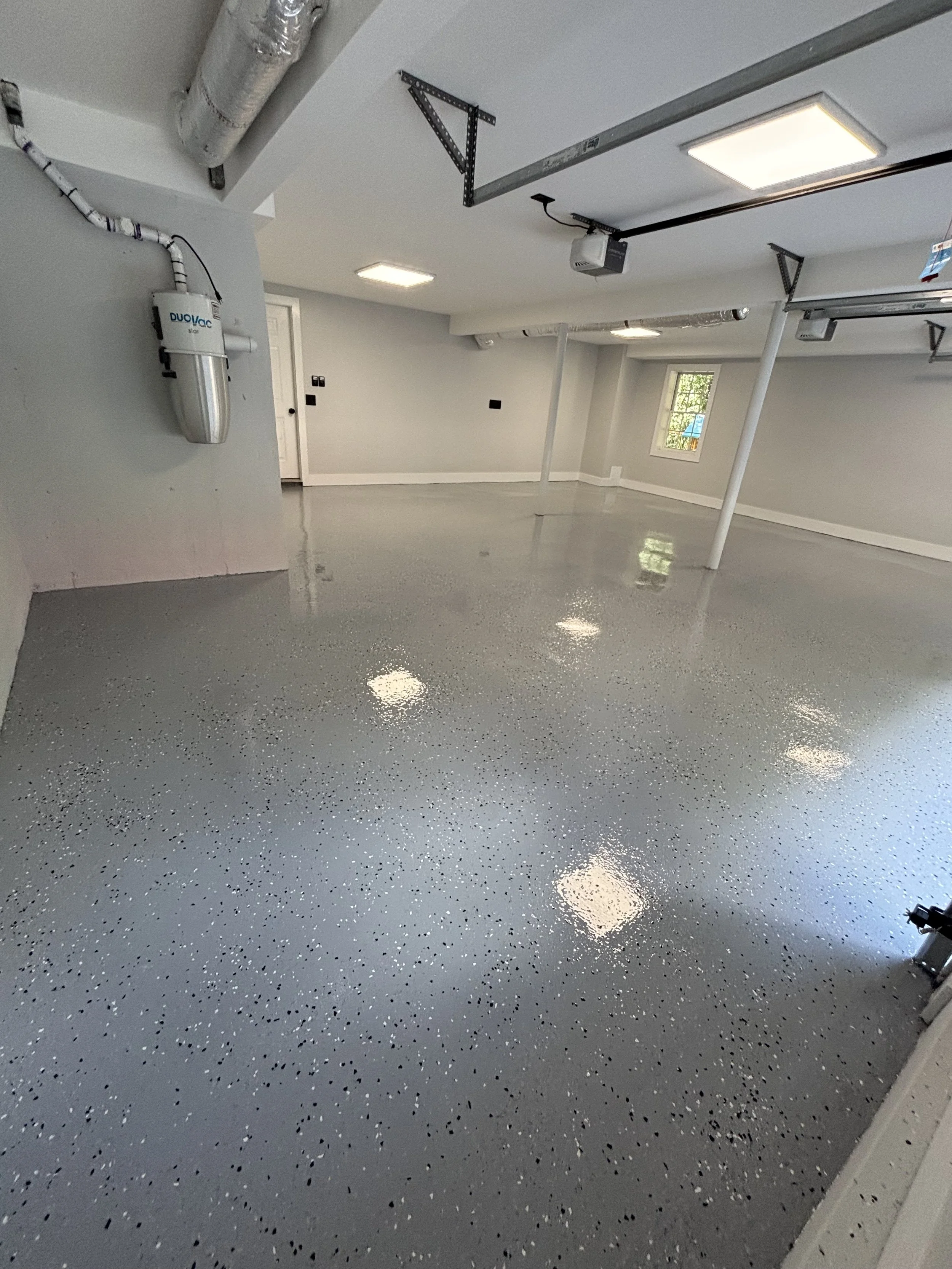 Decorative flake epoxy floor system installation