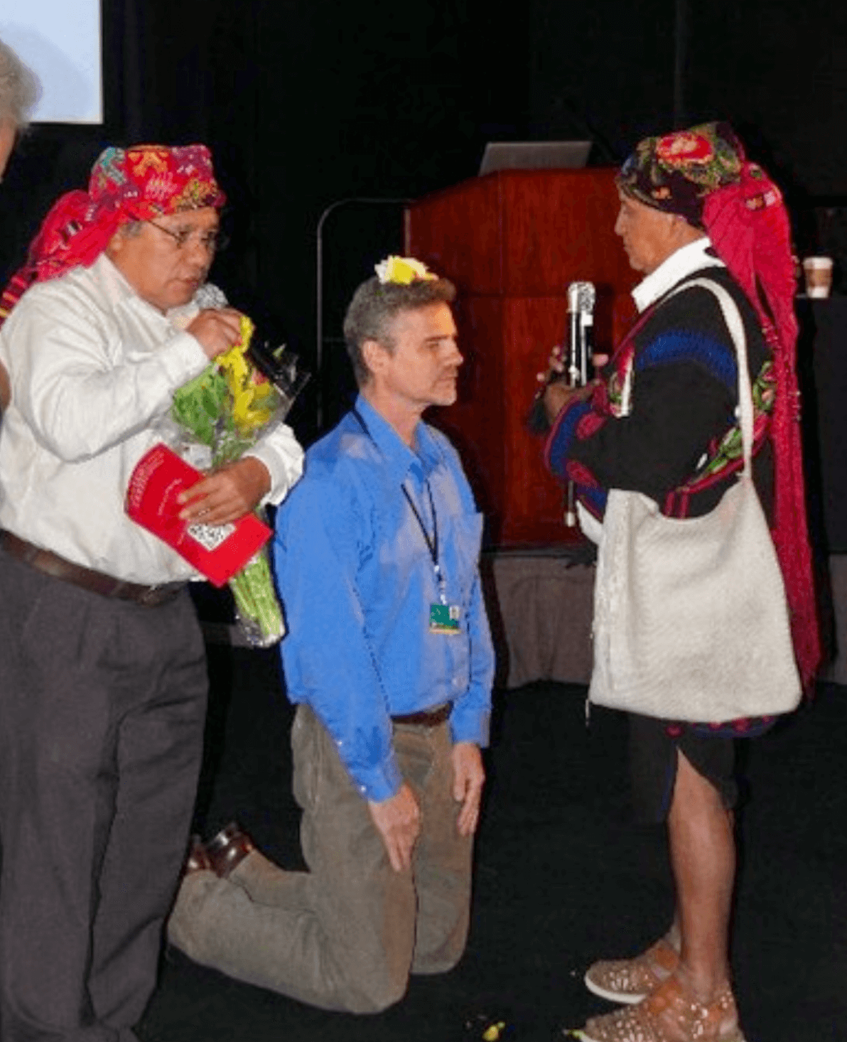 Photograph of Rossilli, during the Los Angeles Art Show in 2014, being honored and blessed by the religious Mayan elders of Chichicastenango, Guatemala.&nbsp;