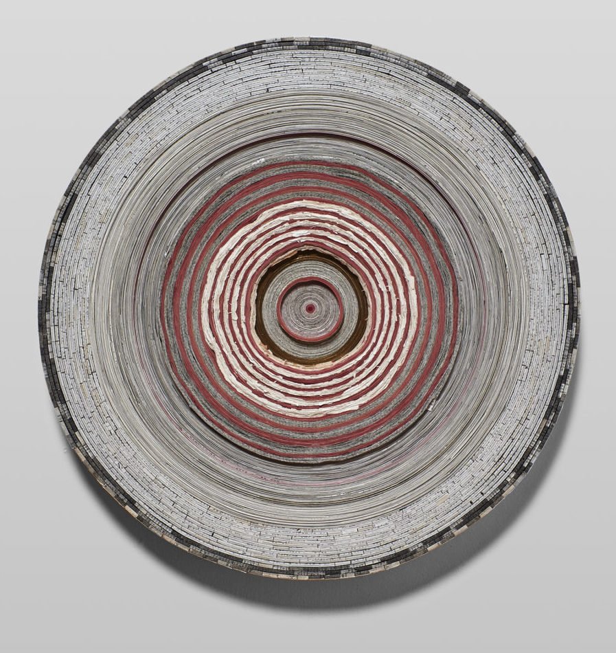"First Book no 6", Paper and covers from one Bible, museum board, and heritage corrugated board. Diameter: 17.5 Thickness: 2