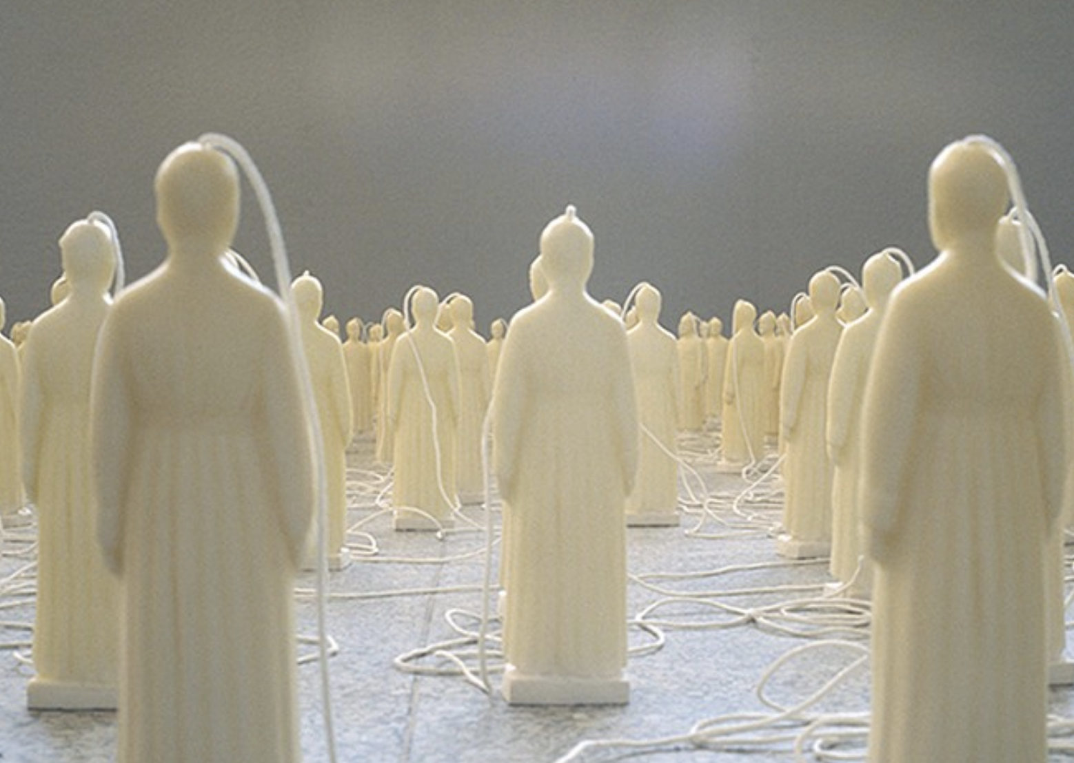 Illuminee Part 1: 300 7” tall sculptures made of ceramic dipped in beeswax with 6' wicks.
