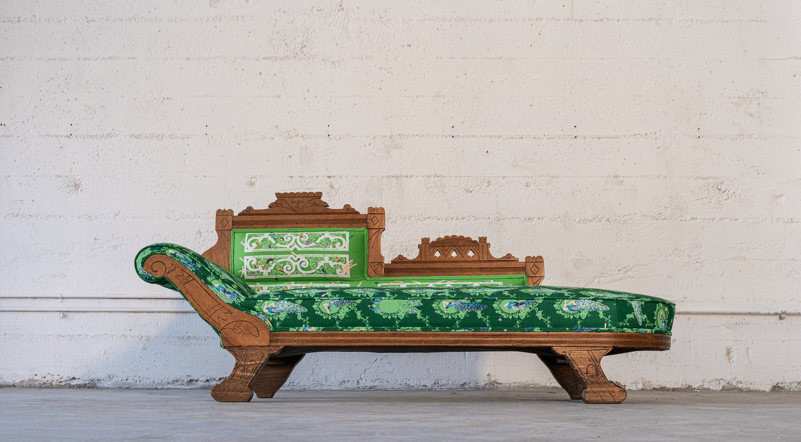 Christy Chan, Fainting Couch, 2022, antique fainting couch, polypropylene fabric, fabric dye, foam, metal springs, glue, pins, 57” x 24” x 16.”Photo by James Ken Butler.