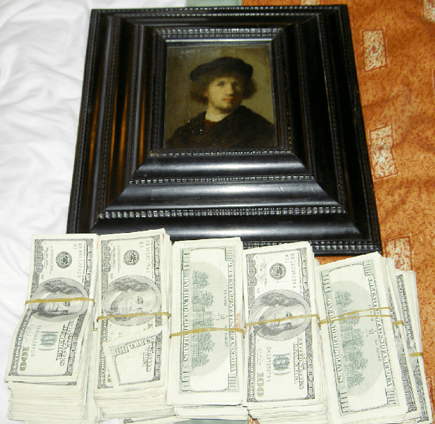 A Rembrandt painting with cash after it was recovered by Wittman