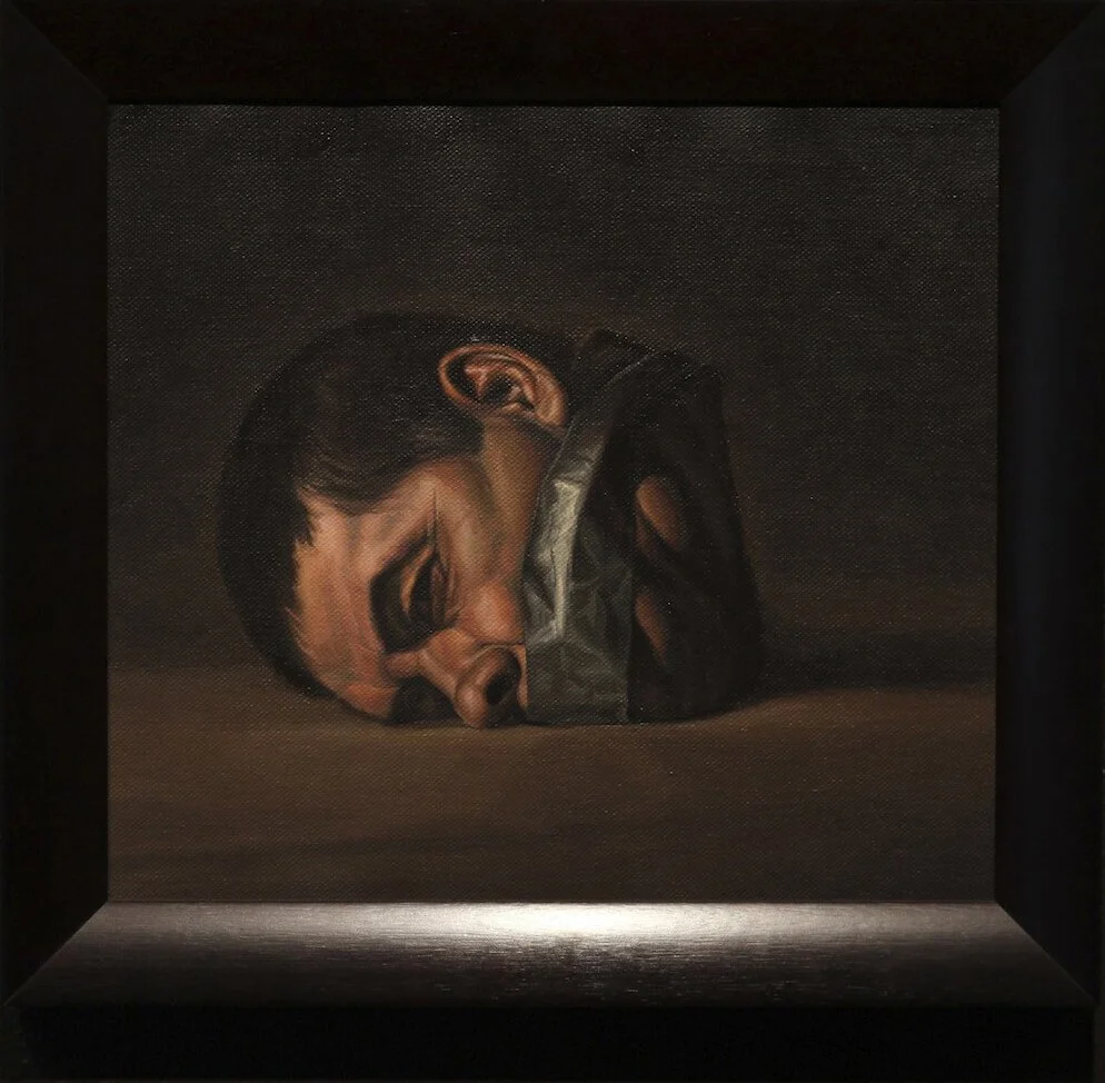 Portrait of a man beheaded with duct tape on mouth