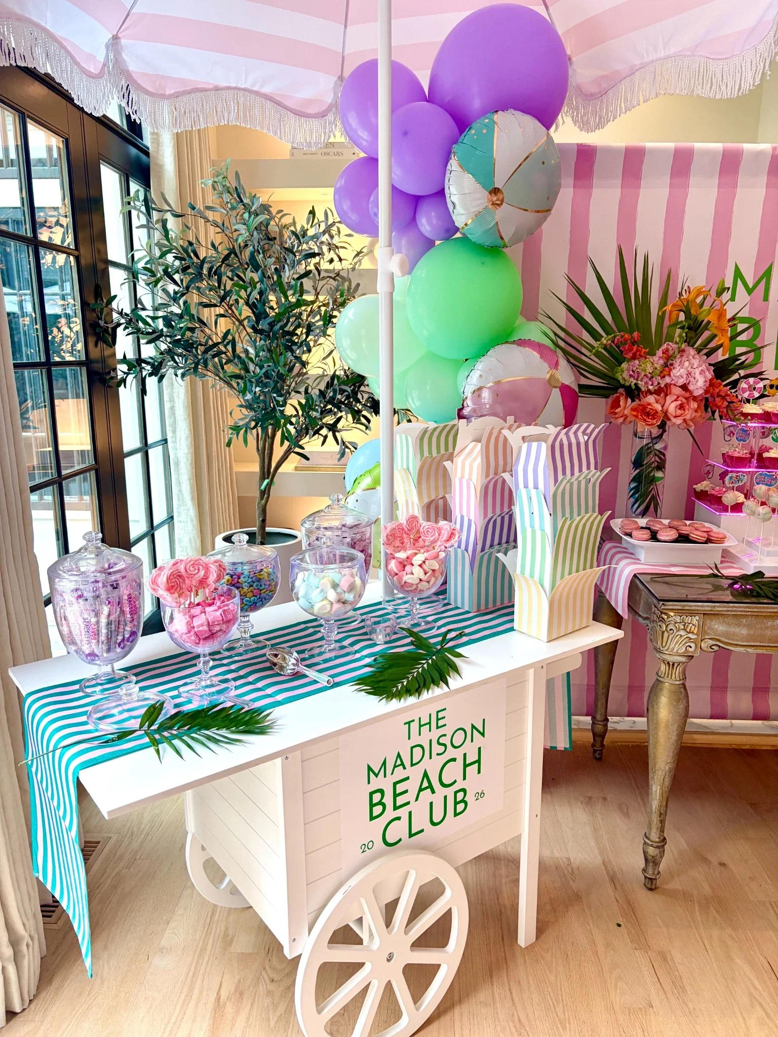 Luxury candy cart with customized sign with balloons in NJ
