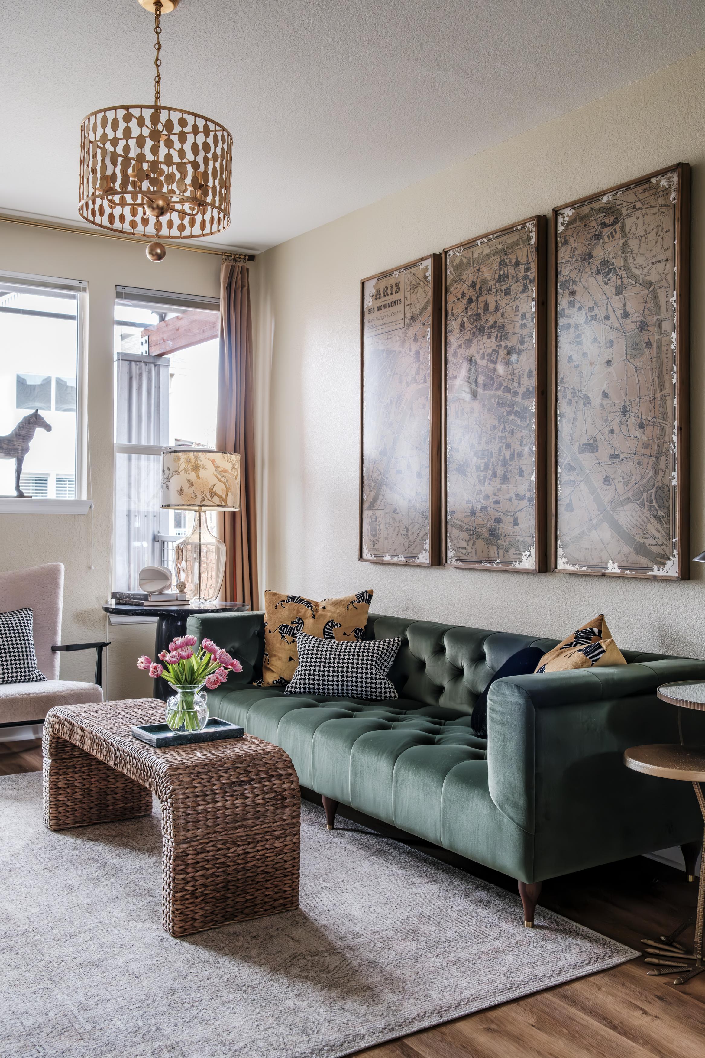 This space is great example of Parisian design usually characterized by the blending of old and new, mixing different furniture styles and of course that spruce green is classic Paris.