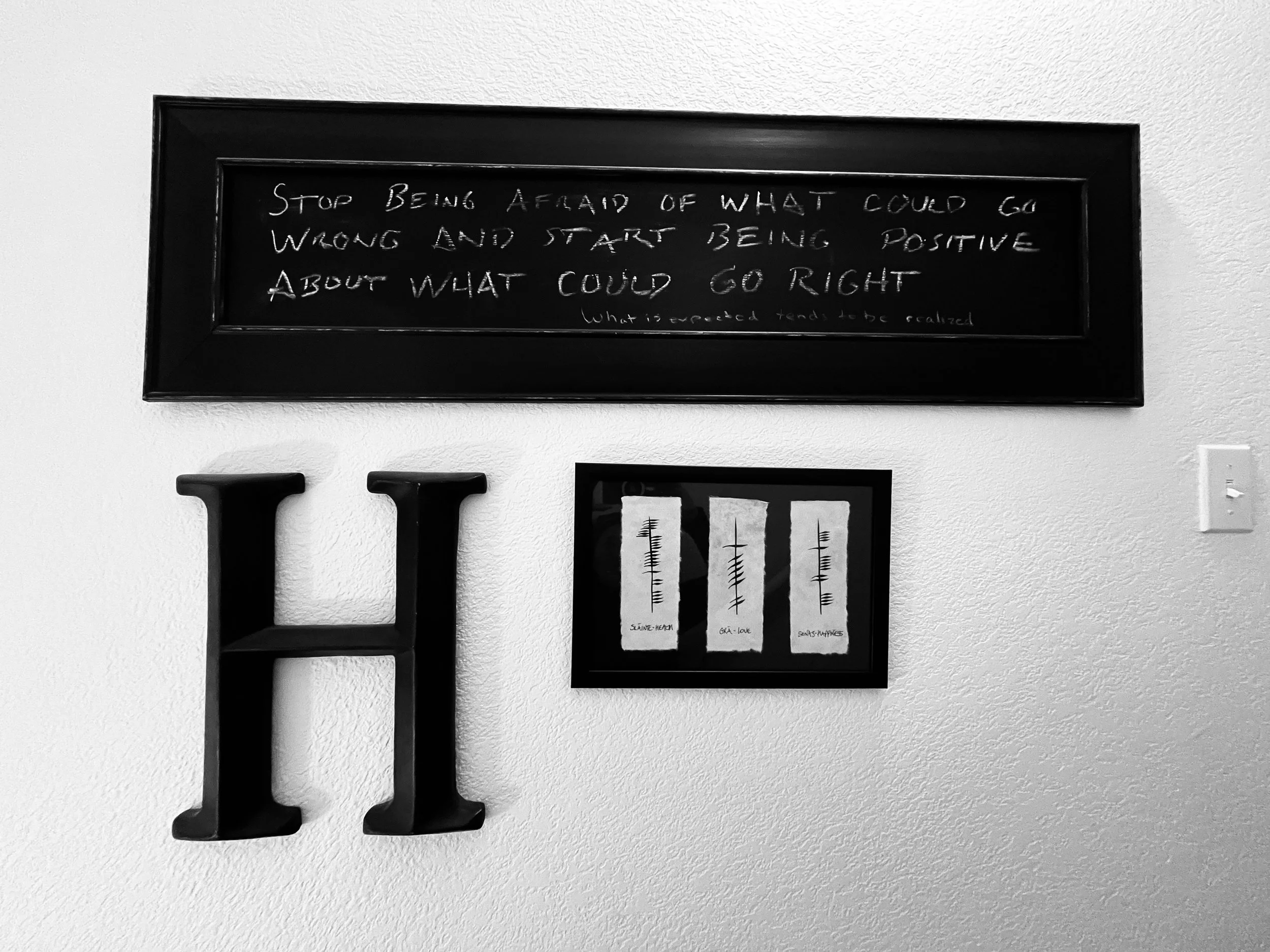 Letter 'H' on the wall as art.