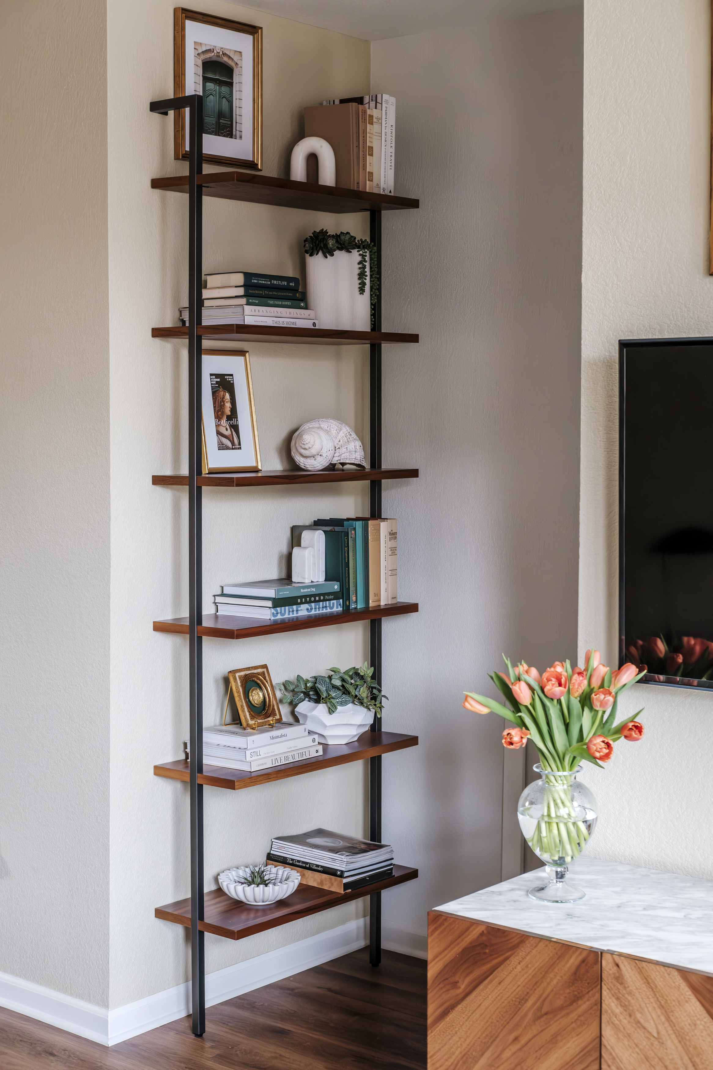 Space saving stairwell book shelf.