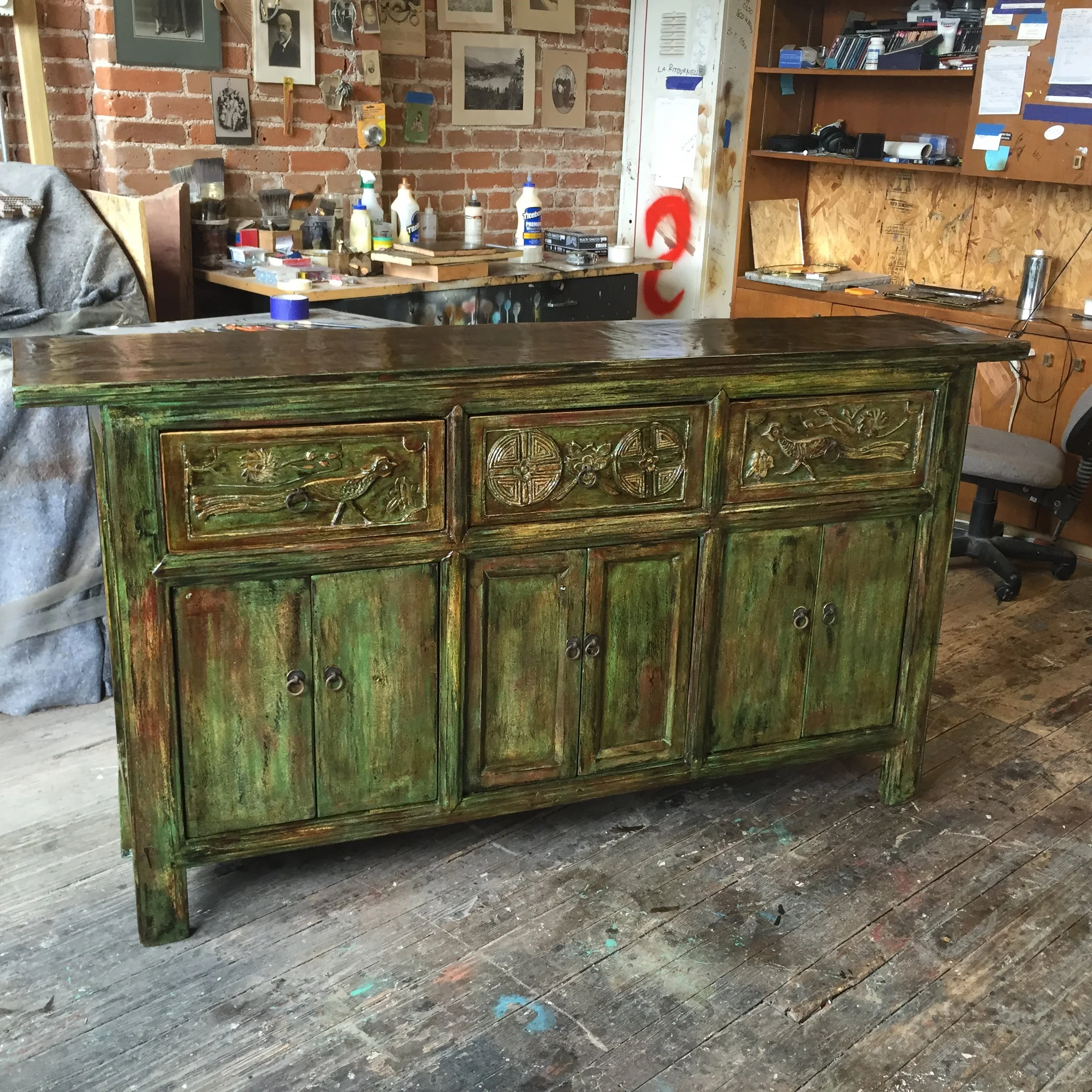 The custom multi tonal finish on this antique sideboard makes it into a showstopper.