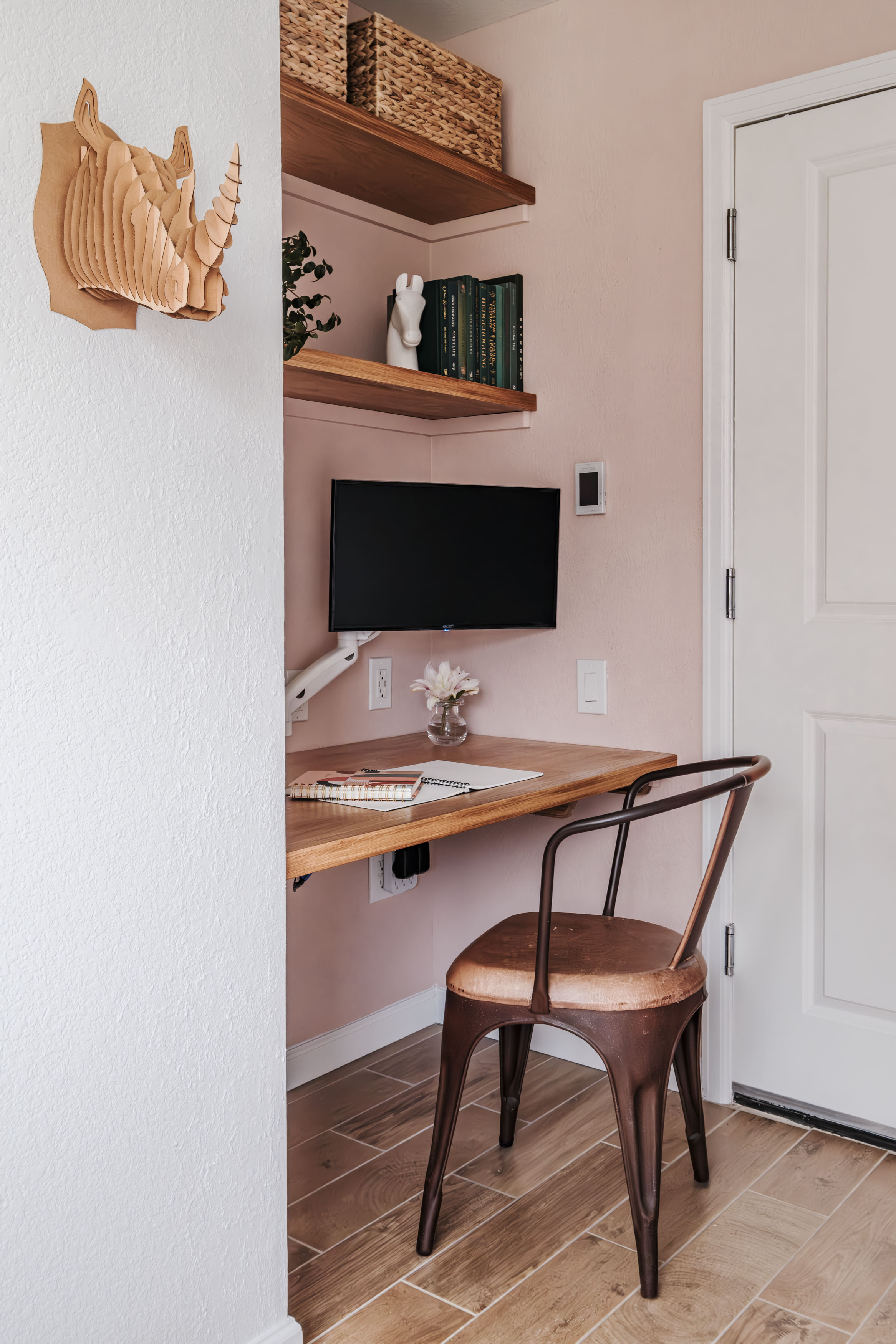 This work-from-home office closet aka "cloffice" in this small Denver townhome provides a dedicated area for the homeowner to spend focused time.