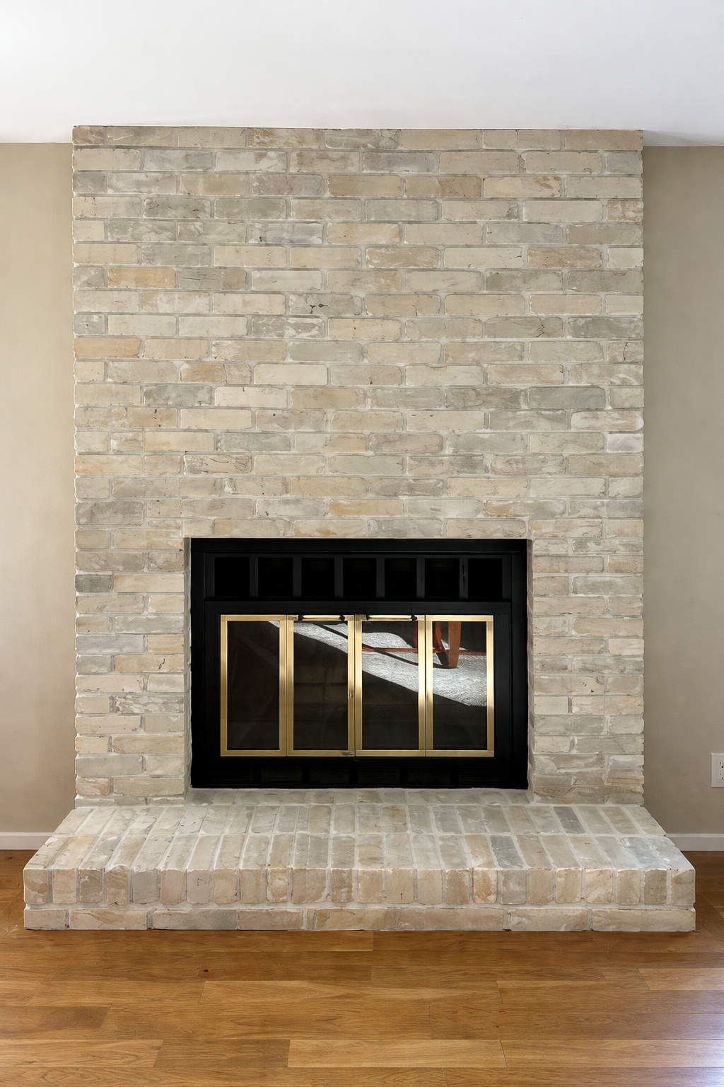 Limewash is one of the easiest and inesxpensive ways to lighten and brighten an old, dated red-brick fire place. 
