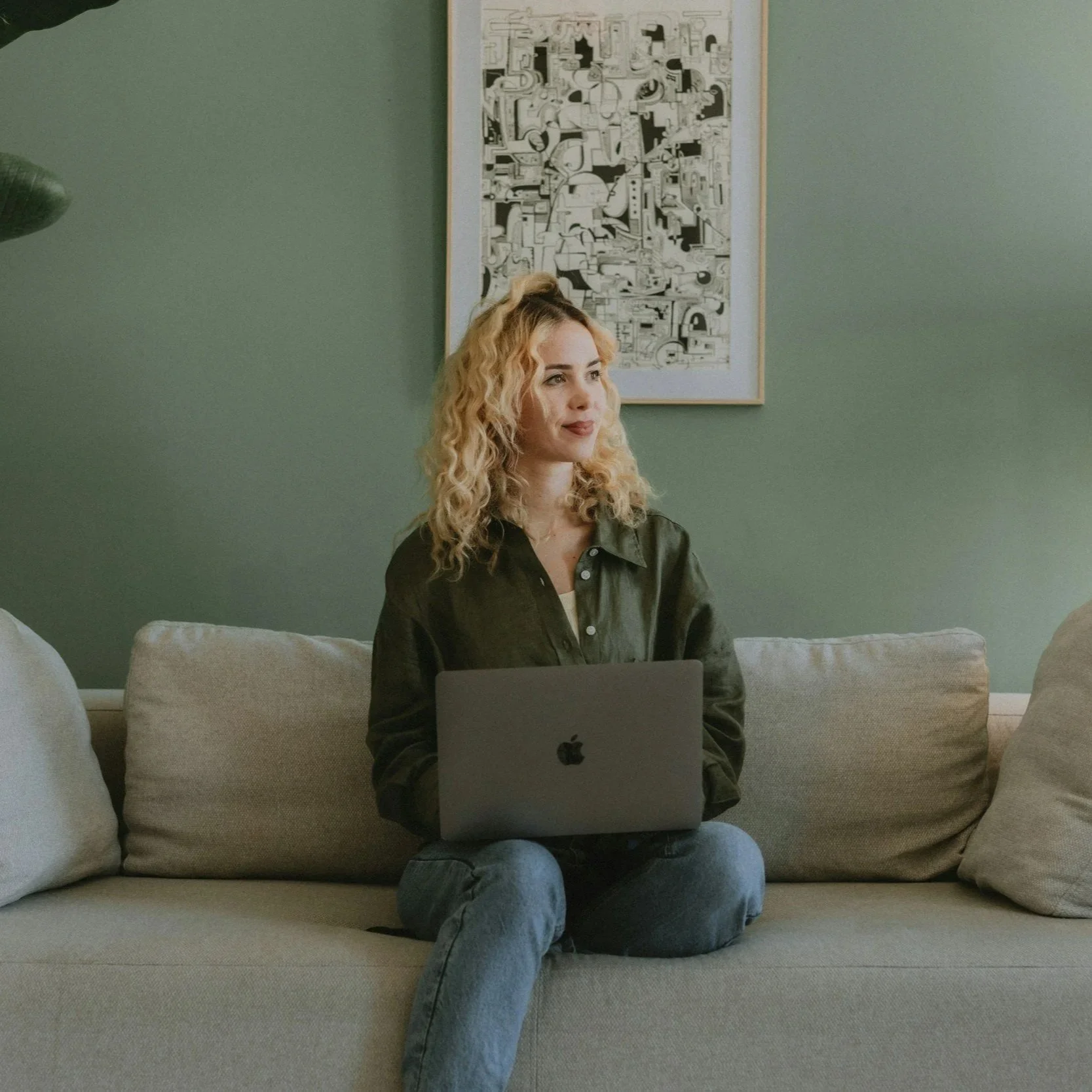 Girl participating in an online Christian grief counseling session on her laptop from the comfort of home.