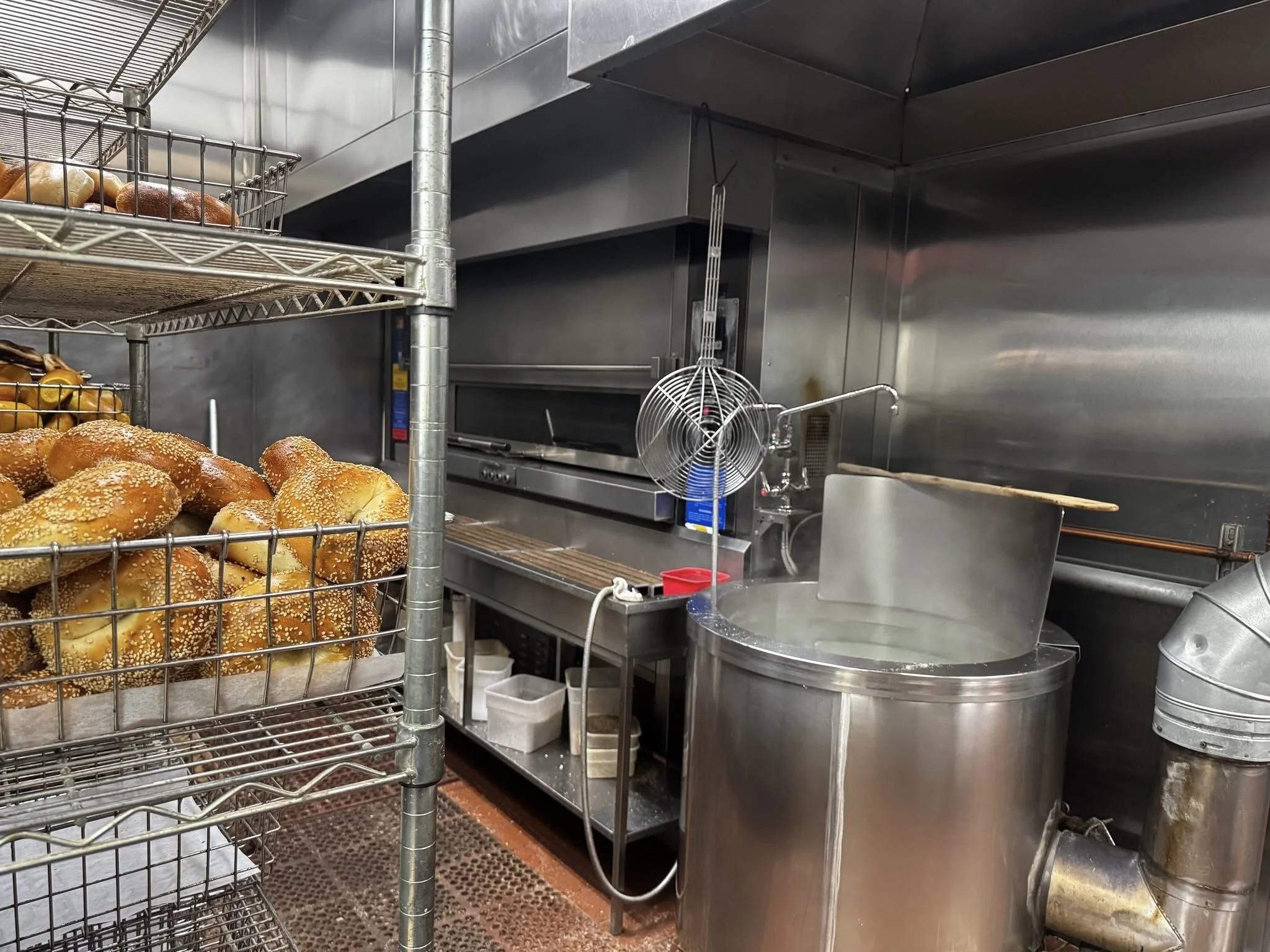 Commercial bagel bakery equipment at Bagel Chalet in Commack, New York, including industrial ovens and production systems serviced by William's Mechanical.