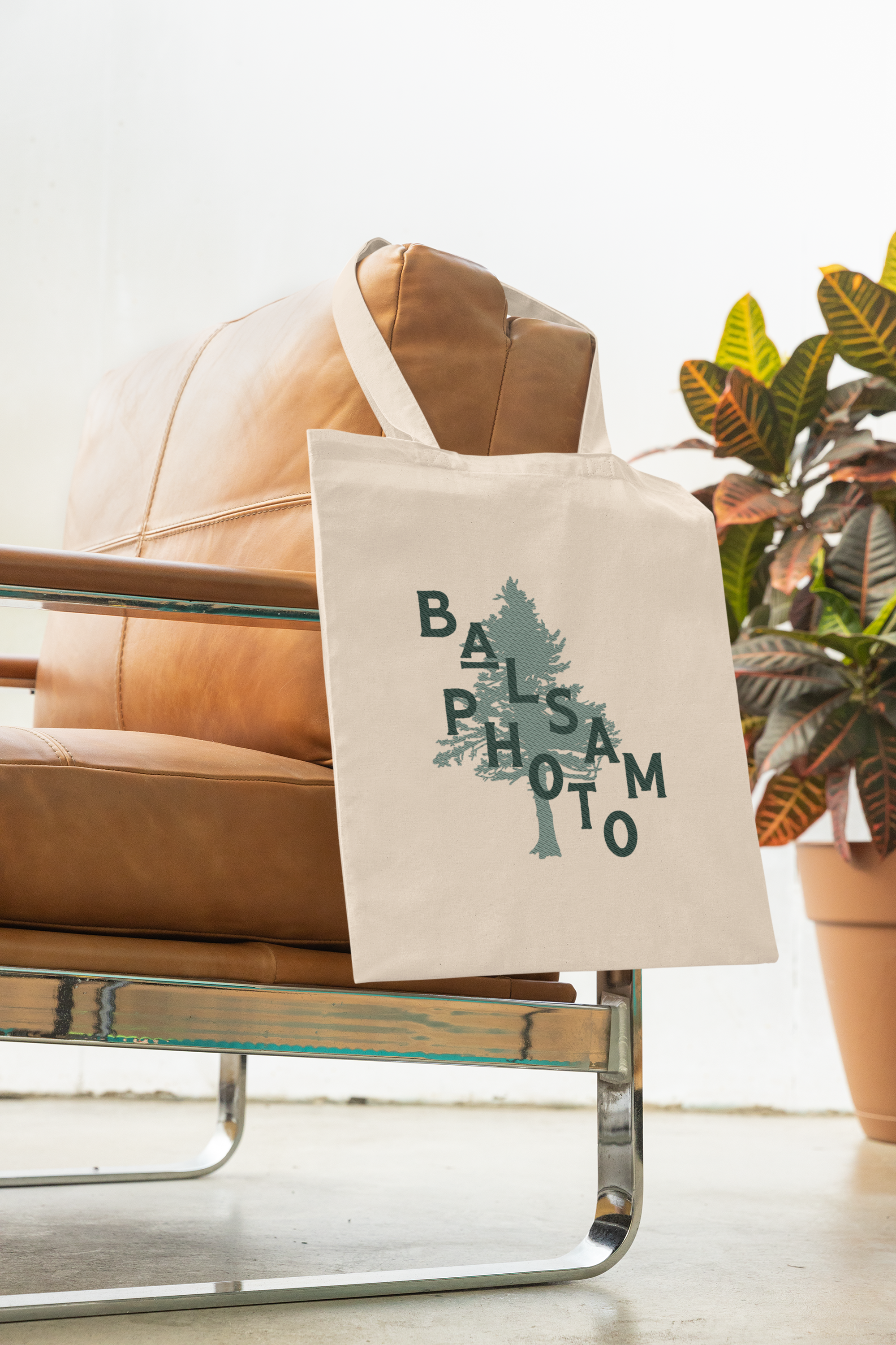 mockup-of-an-embroidered-tote-bag-hanging-from-an-armchair-m33048.png