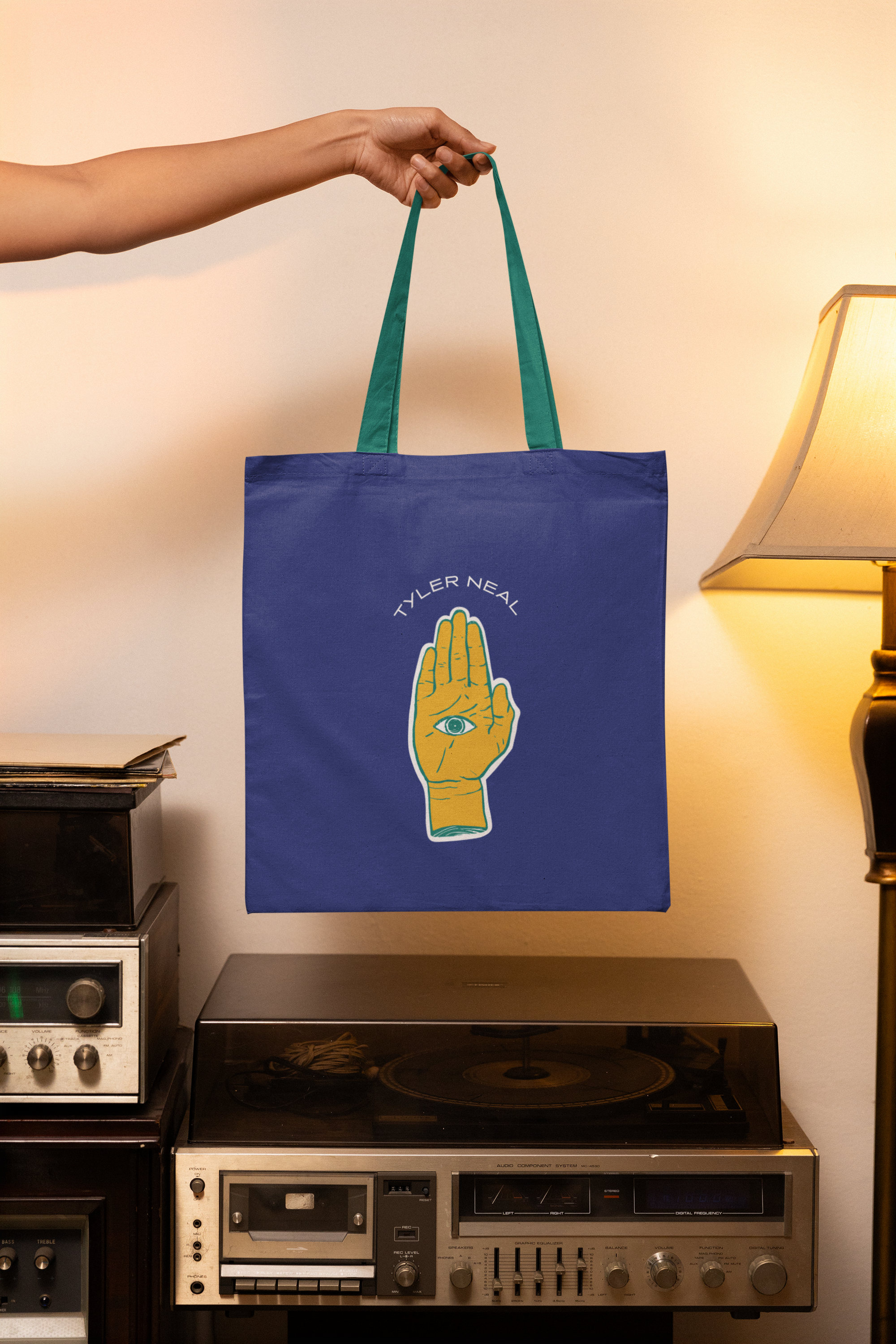 mockup-of-a-woman-carrying-a-tote-bag-near-some-old-vintage-vinyl-players-m37040 (3).png
