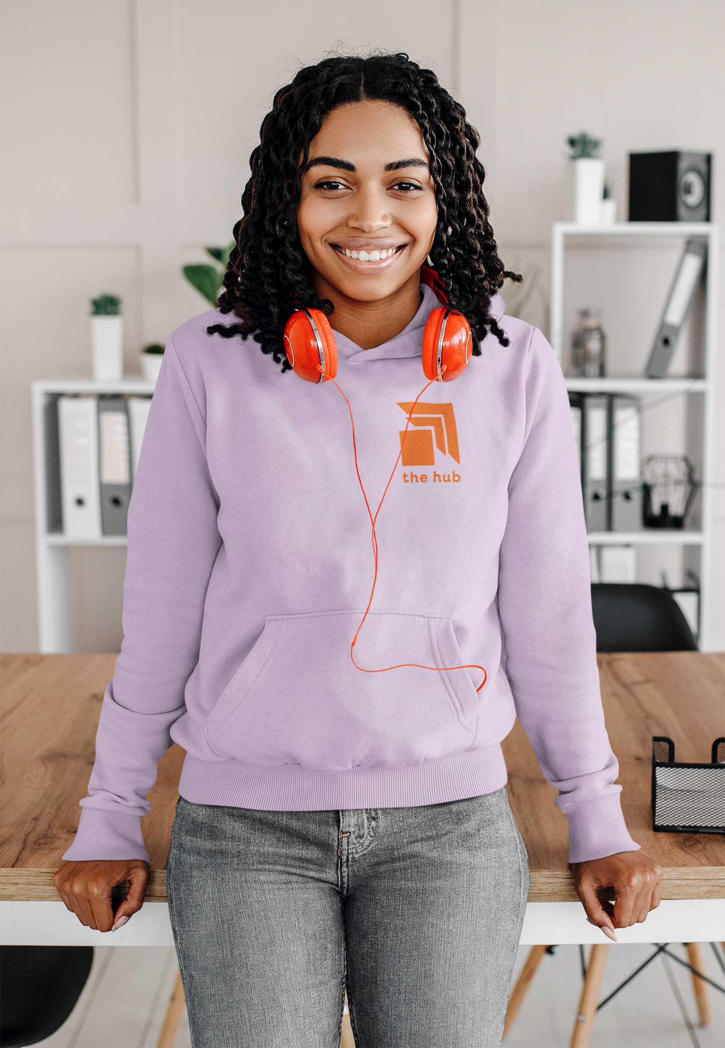 mockup-of-a-young-woman-with-curly-hair-wearing-a-hoodie-at-home-39072-r-el2.png