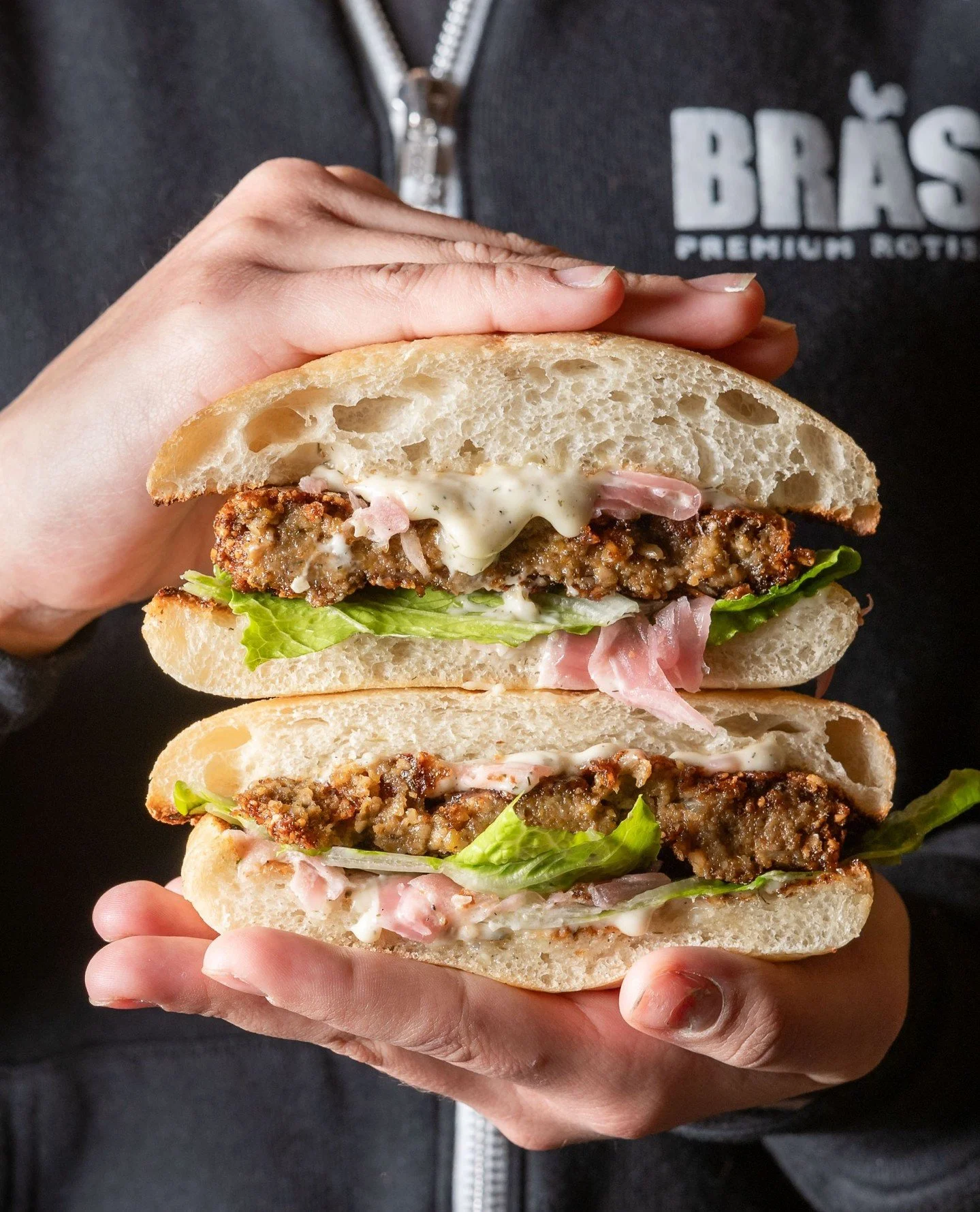 The news sucks these days. But, we have some good news: our new Mushroom and Chickpea Fritter sandwich is here 💯⁠
⁠
Crispy mushroom, caramelized onion and chickpea fritter, lettuce, pickled red onion, vegan herb aioli on a toasted ciabatta roll. Fre
