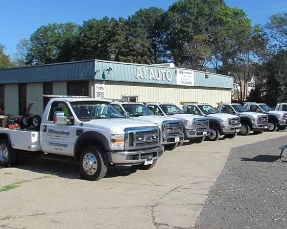 AlsTowTrucks+%281%29.jpg