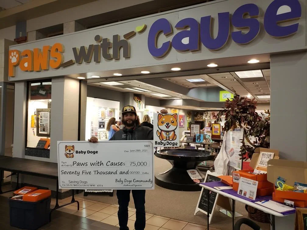 Baby Doge community believes in a better world for them. They donated $75,000 to Paw Arty by Paws with Cause 