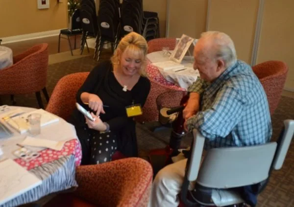 Paws With Cause engages seniors in art while bringing awareness to shelter animals