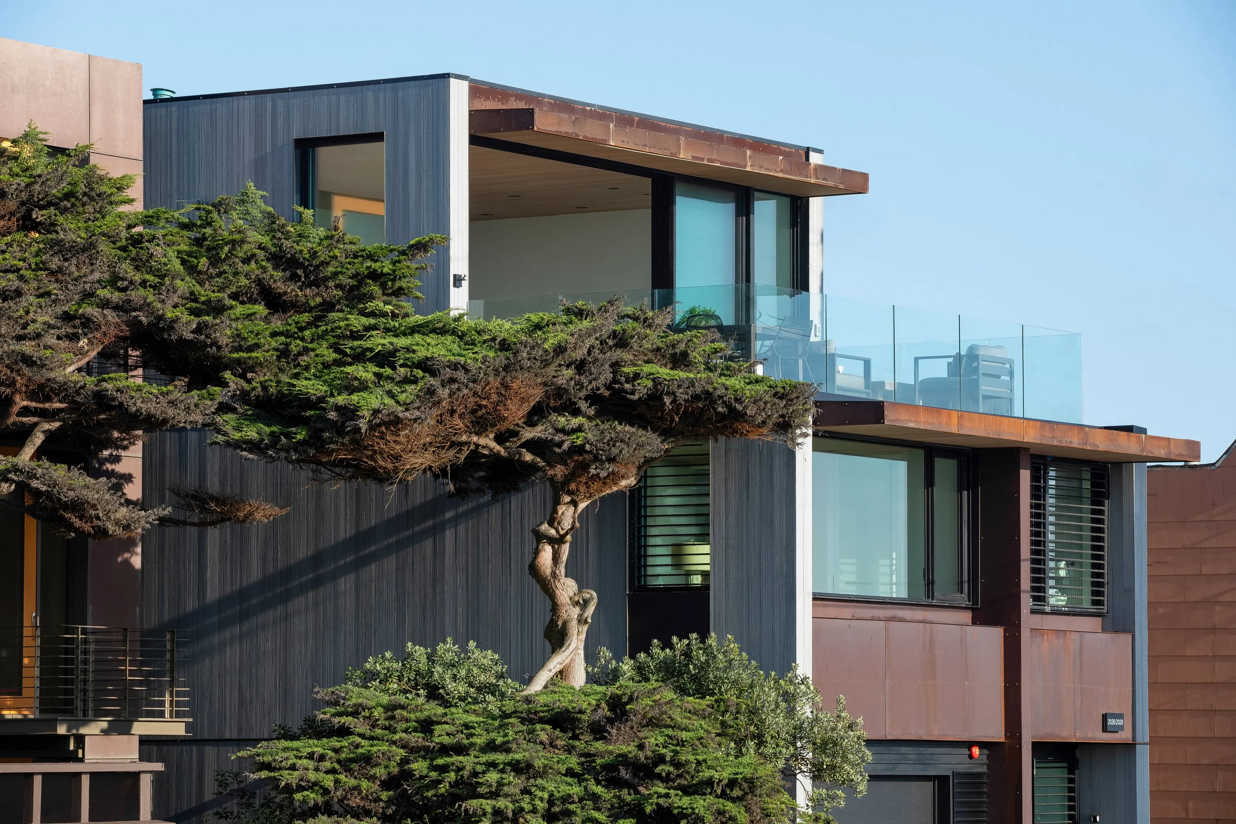 Exterior showing the color wash on the siding which gives it a sophisticated yet warm look. This treatment also provides excellent long lasting protection from the elements.