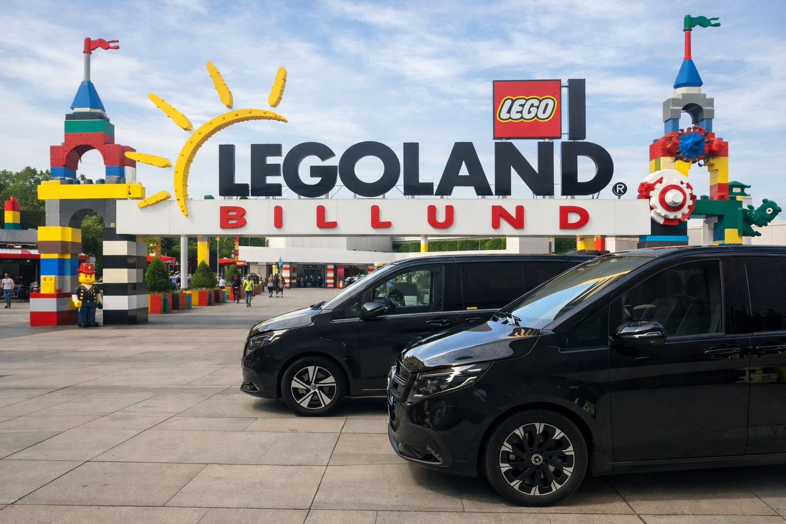 2 Black Mercedes limousines Vans Parked in front of Legoland Billund entrance waiting for customers for private transport