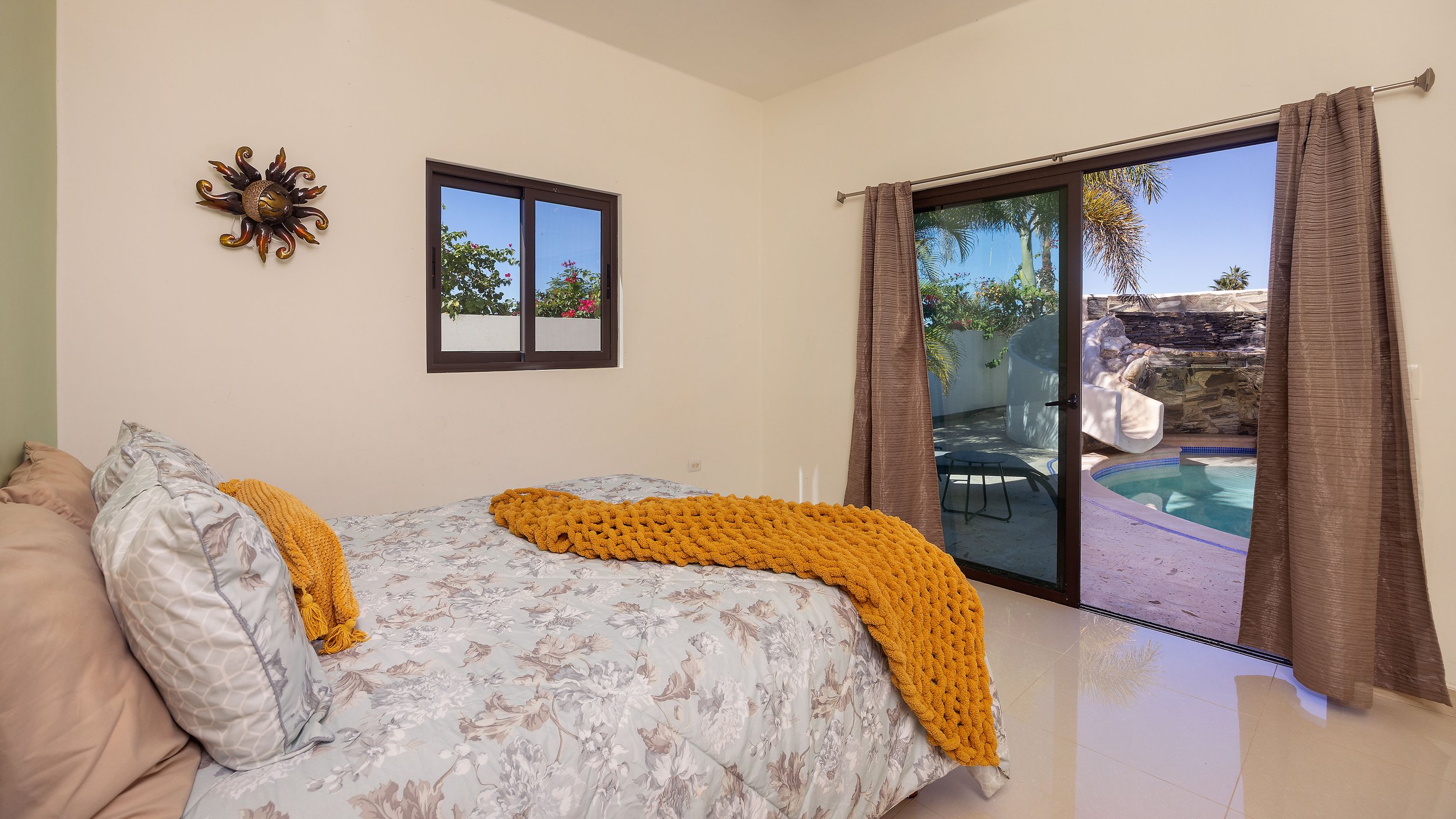 Main-floor bedrooms in Villa 2 offering easy Baja beach living.