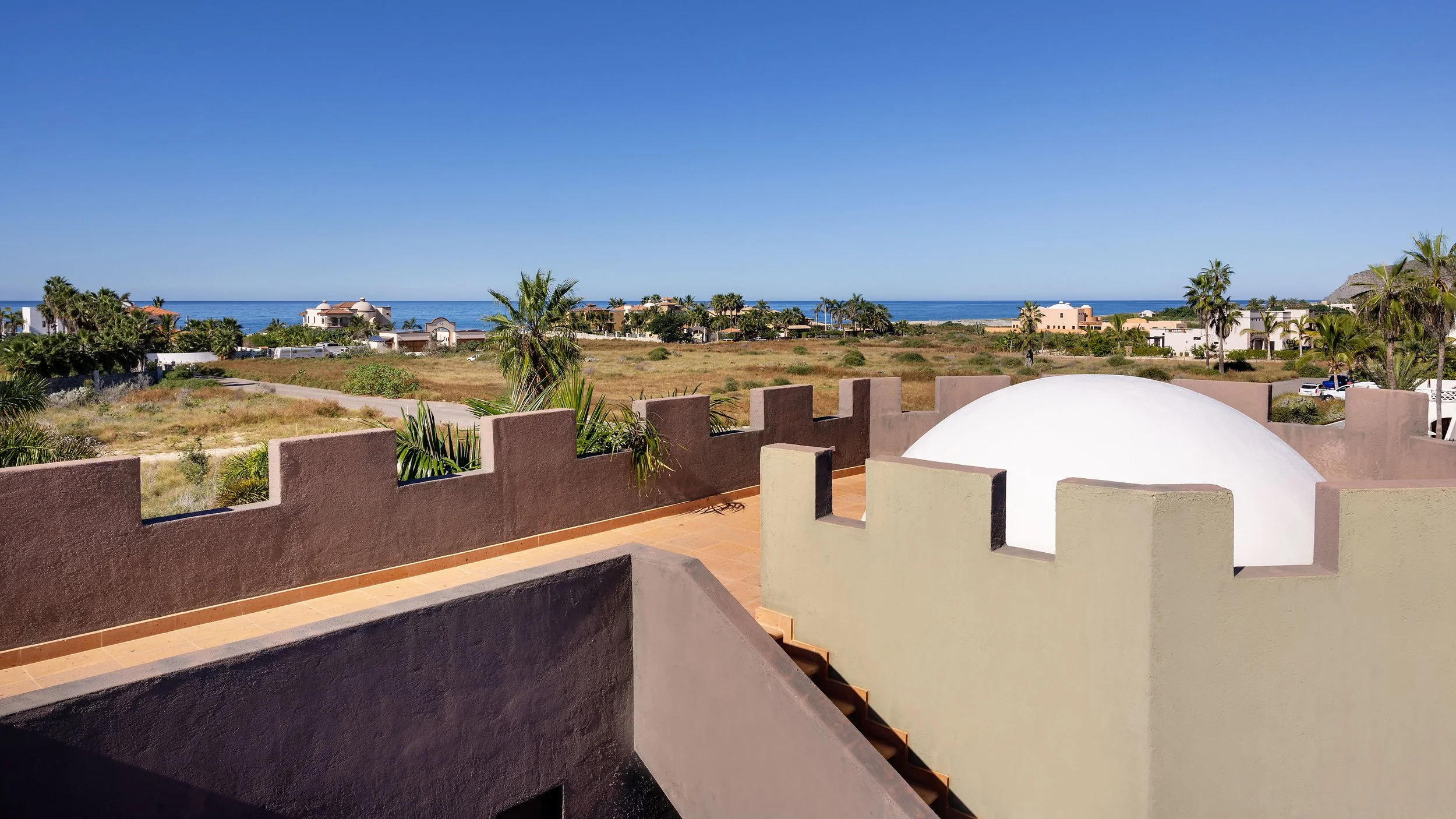 Aerial view of a gated two-villa compound steps from Pescadero in Baja California Sur.