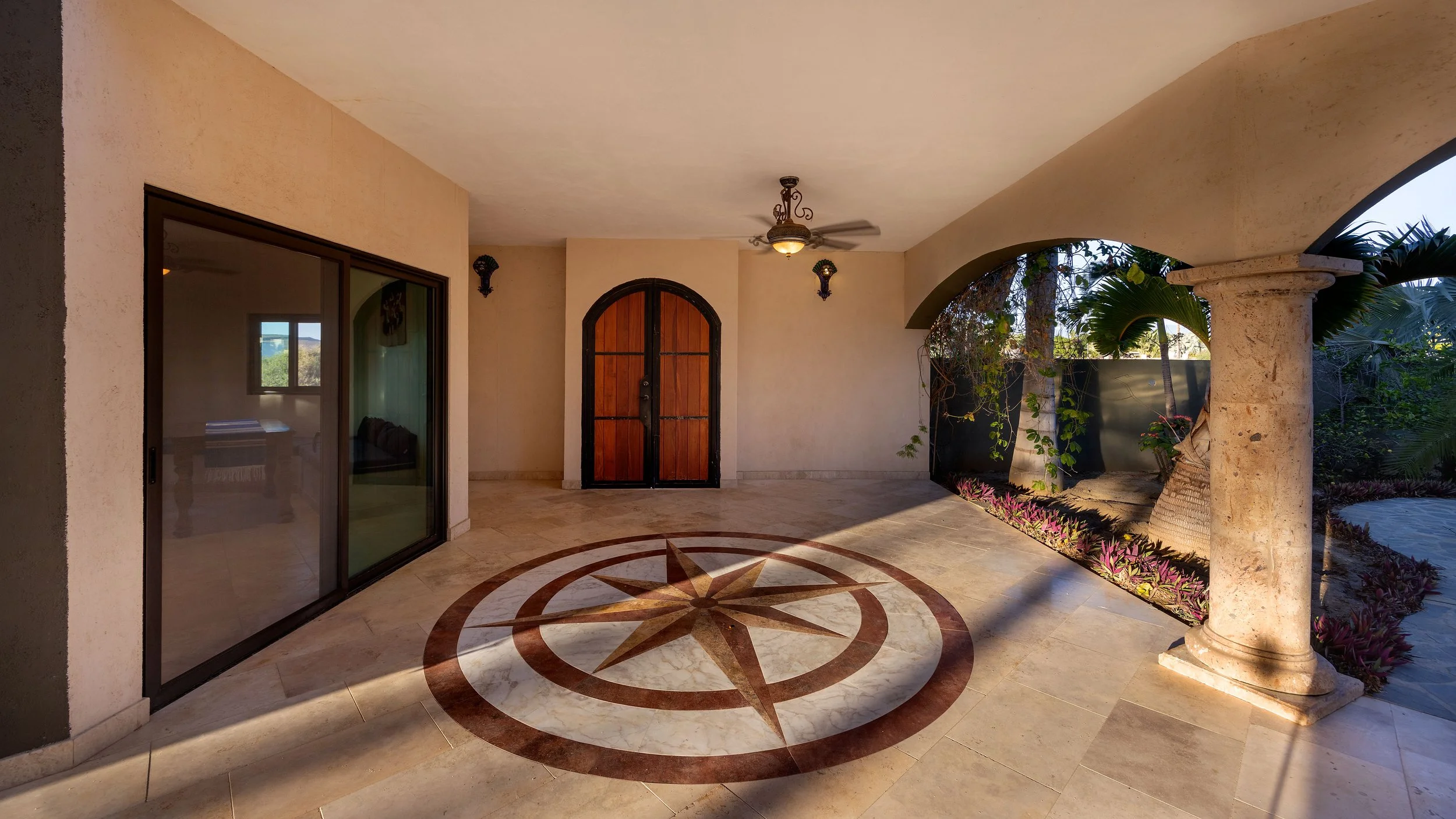 Gated two-home family compound in Pescadero  with private outdoor spaces.