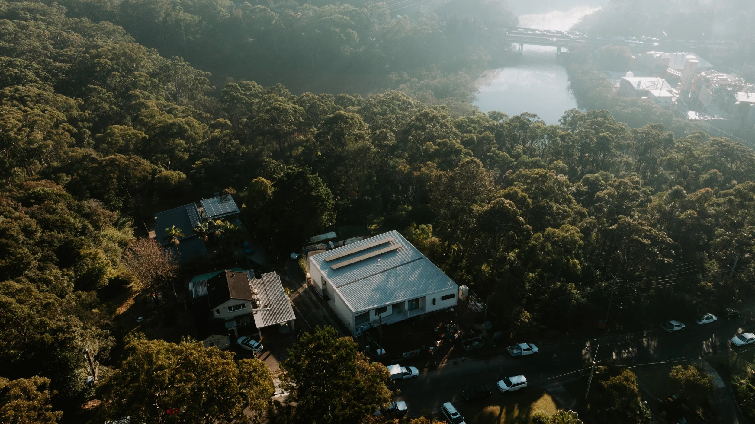 Aerial view of custom-built home in Sydney within greenery