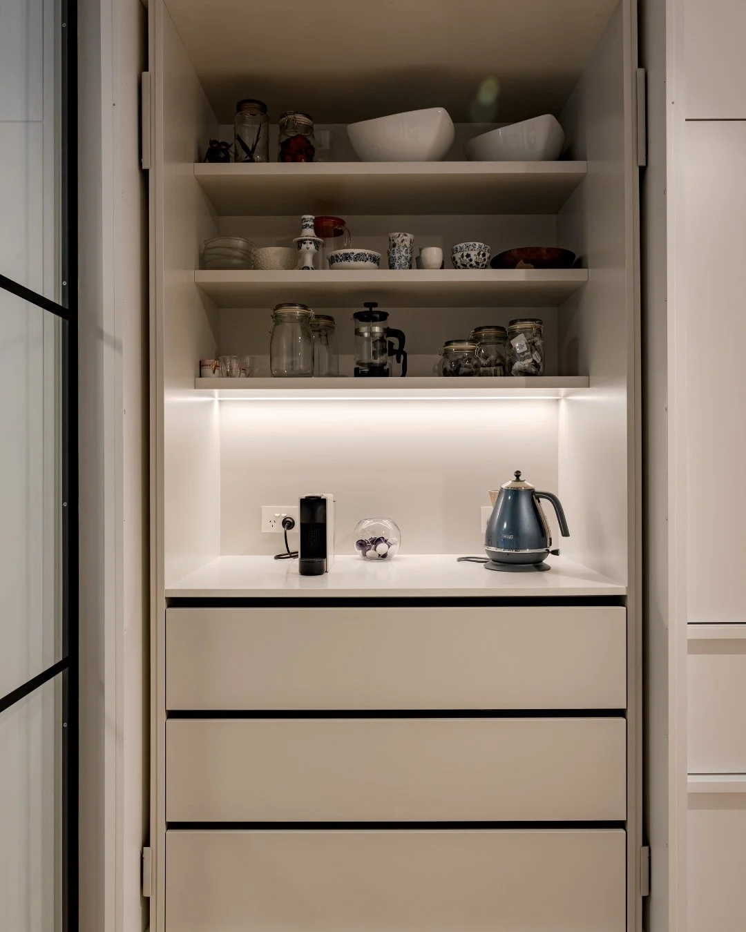 Tucked away in this apartment kitchen is the perfect spot to keep all those small items that can clutter your benchtop. We love collaborating with our clients to understand their lifestyle and create solutions that make their home work for them.⁠
⁠
⁠