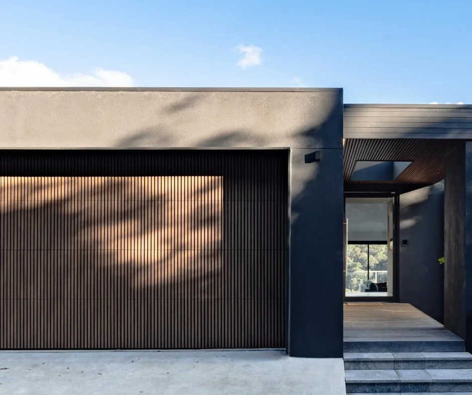 Exhale the moment you arrive home.⁠
This residence makes its first impression long before you step inside, with an exterior designed to blend luxury with grounded elegance. Timber batten cladding creates texture and rhythm, while natural stone featur