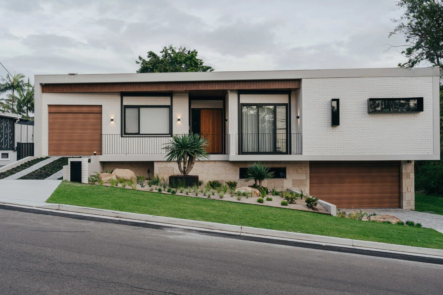 A fully custom home with carefully considered exterior selections that feel both modern and grounded in the natural landscape. Natural materials help the home settle into its environment, while the crisp, architectural lines give it undeniable street